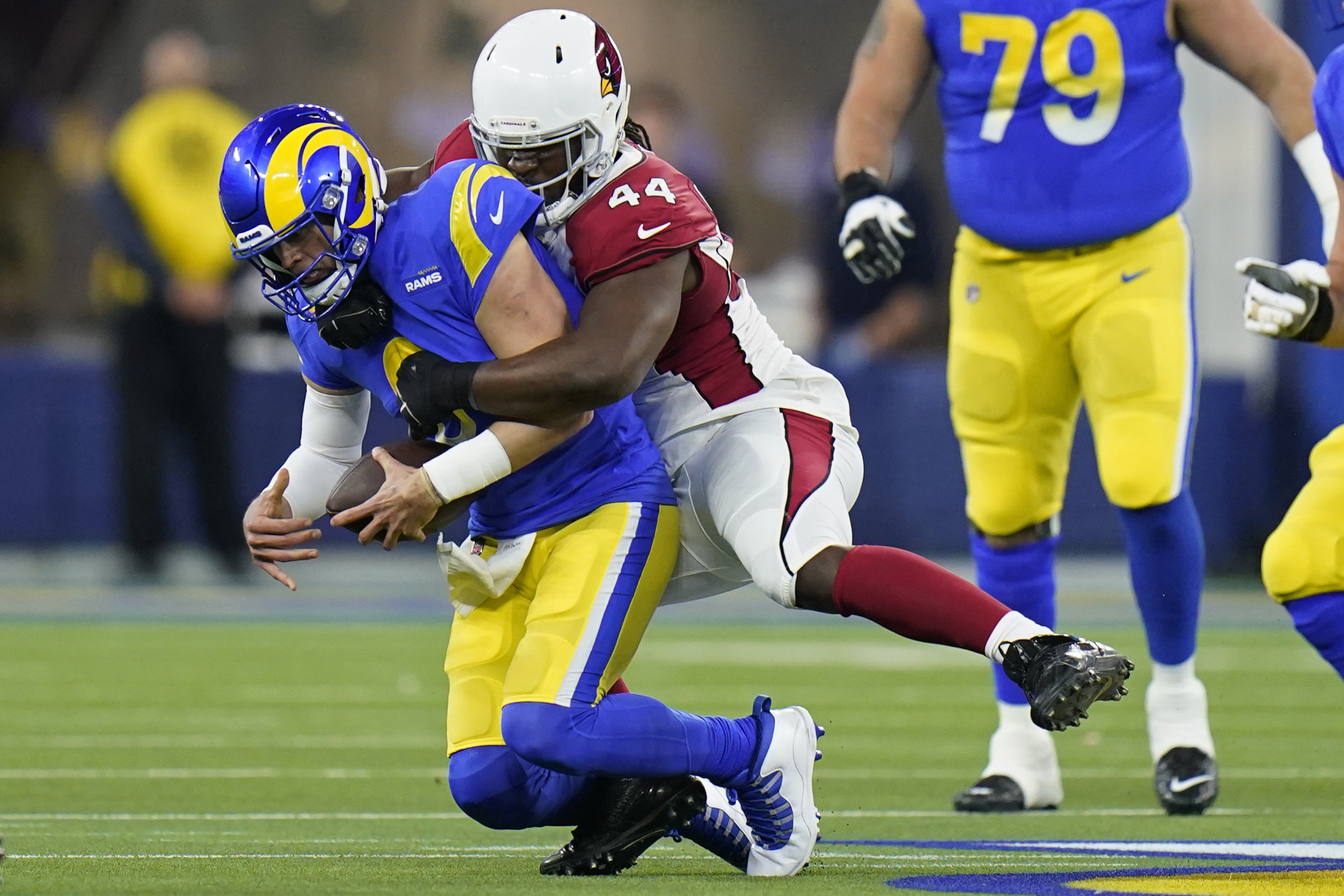 Matthew Stafford propels Rams past Cardinals 34-11 in playoff rout