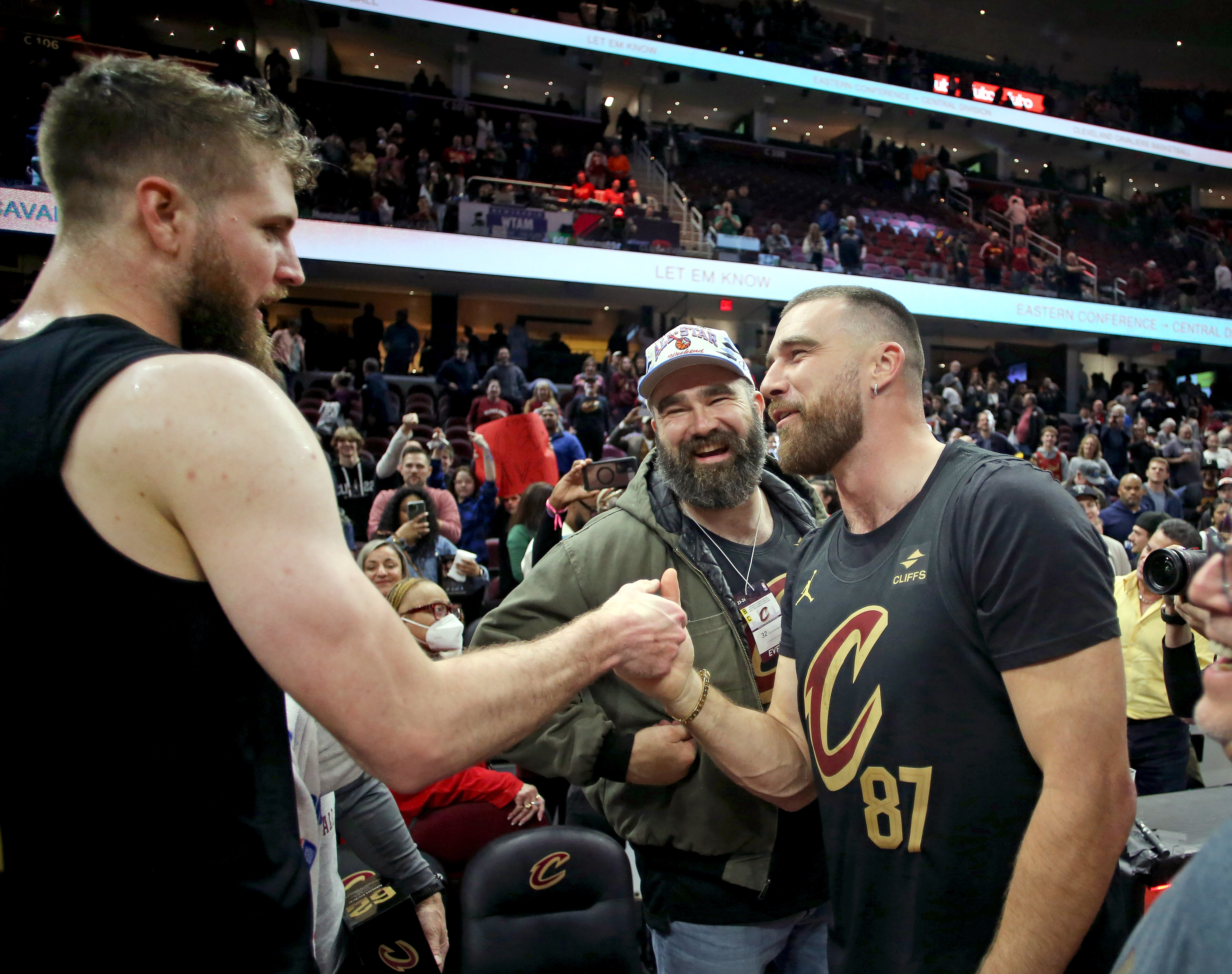 Cleveland Cavaliers forward Dean Wade greets Jason and Travis Kelce after the game against the Boston Celtics. 