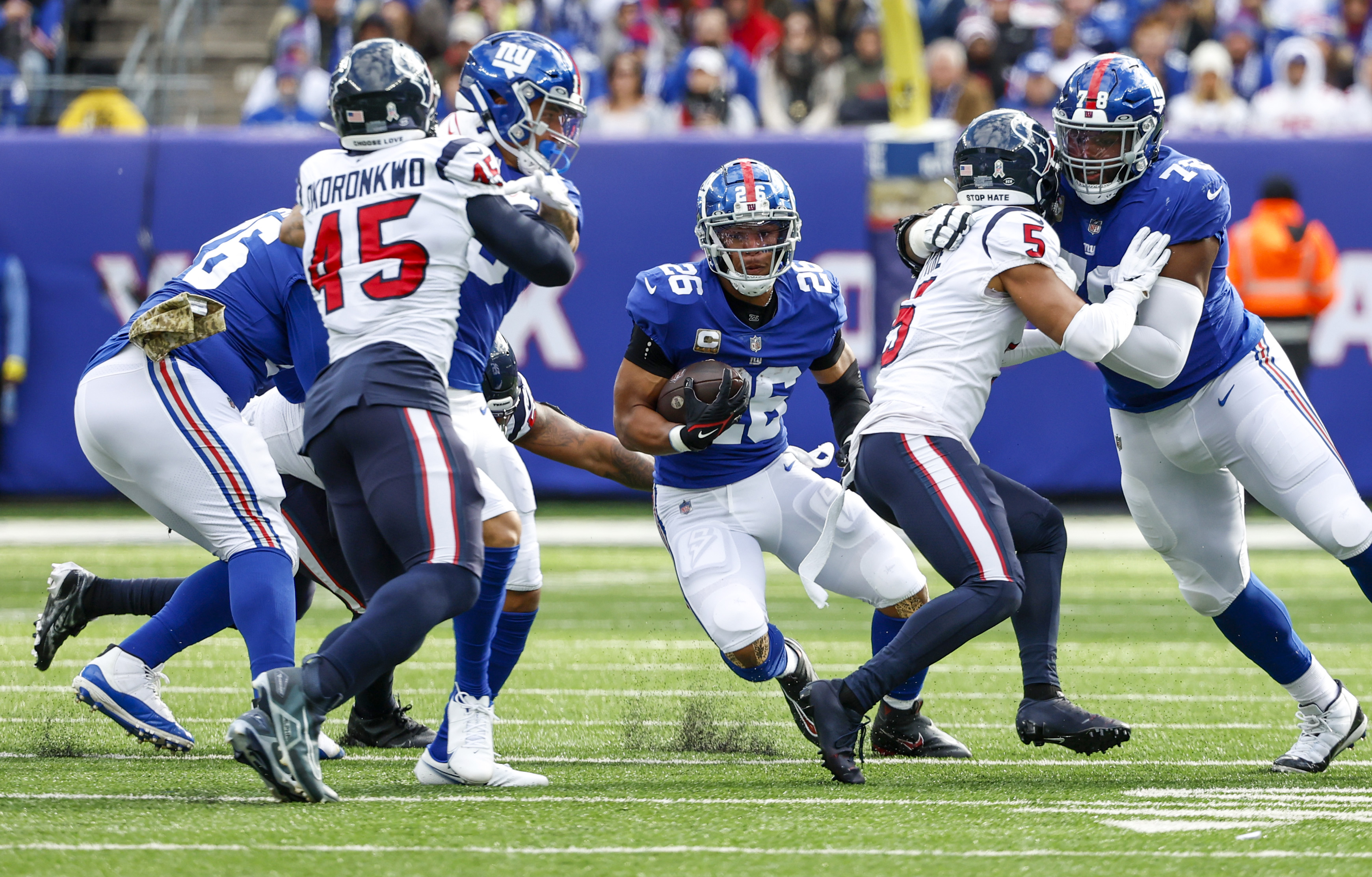 New York Giants running back Saquon Barkley (26) walks off the field after  playing against the Houston Texans in an NFL football game, Sunday, Nov. 13,  2022, in East Rutherford, N.J. (AP