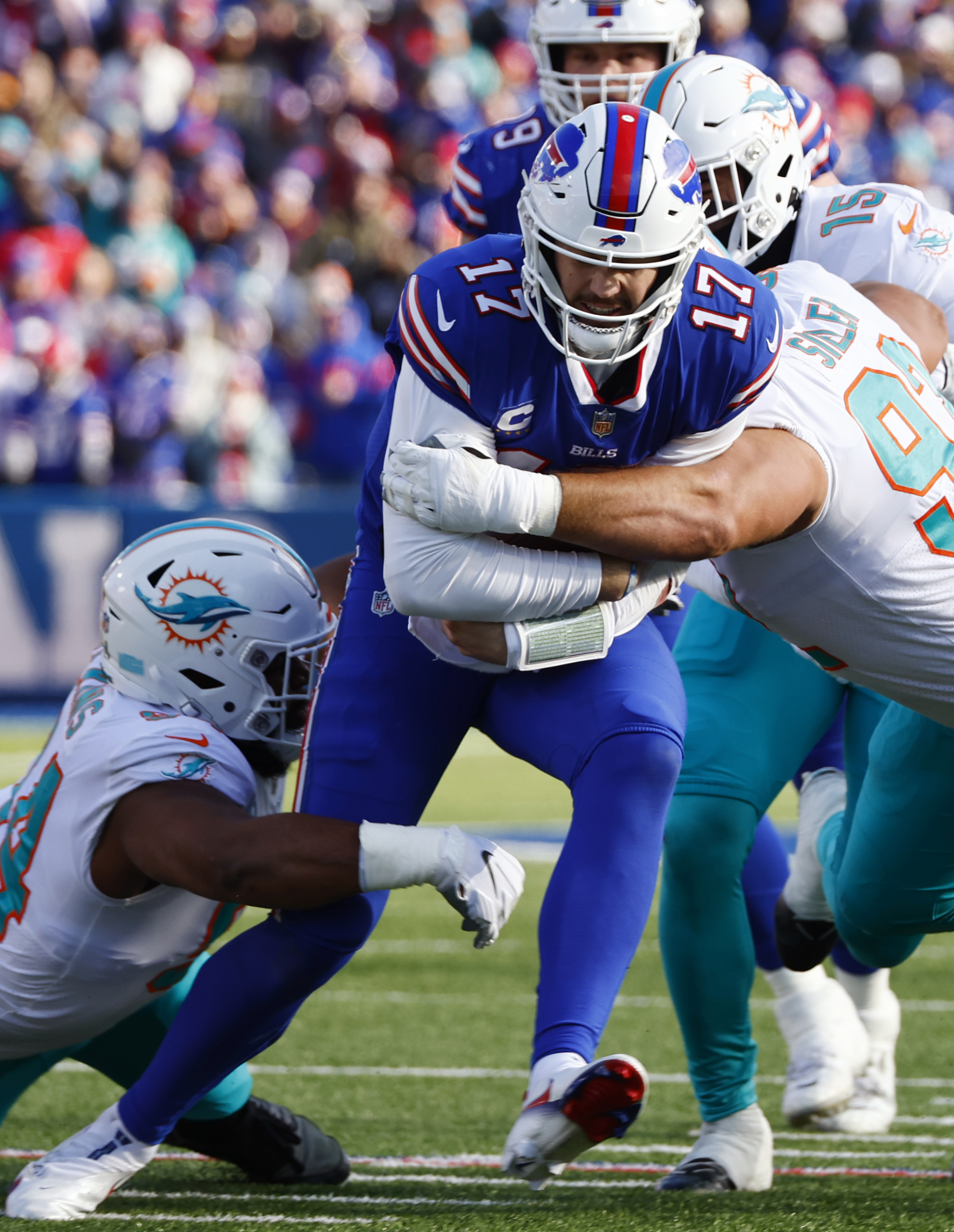 Buffalo Bills' Dion Dawkins lines-up during the first half of an NFL  wild-card playoff football game against the Miami Dolphins, Sunday, Jan.  15, 2023, in Orchard Park, N.Y. (AP Photo/Jeffrey T. Barnes