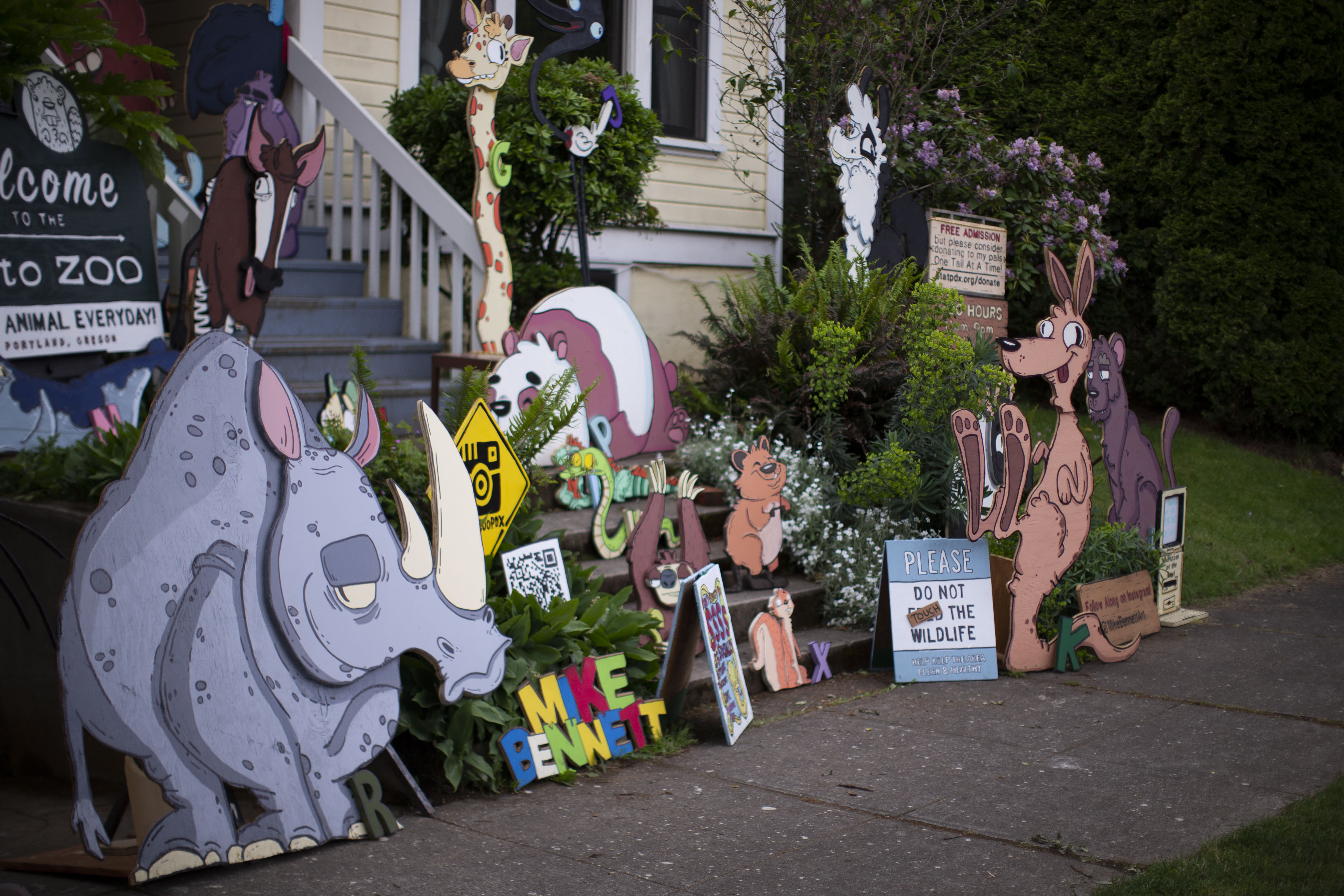 A to Zoo wooden cutout animal menagerie in Alberta Arts District