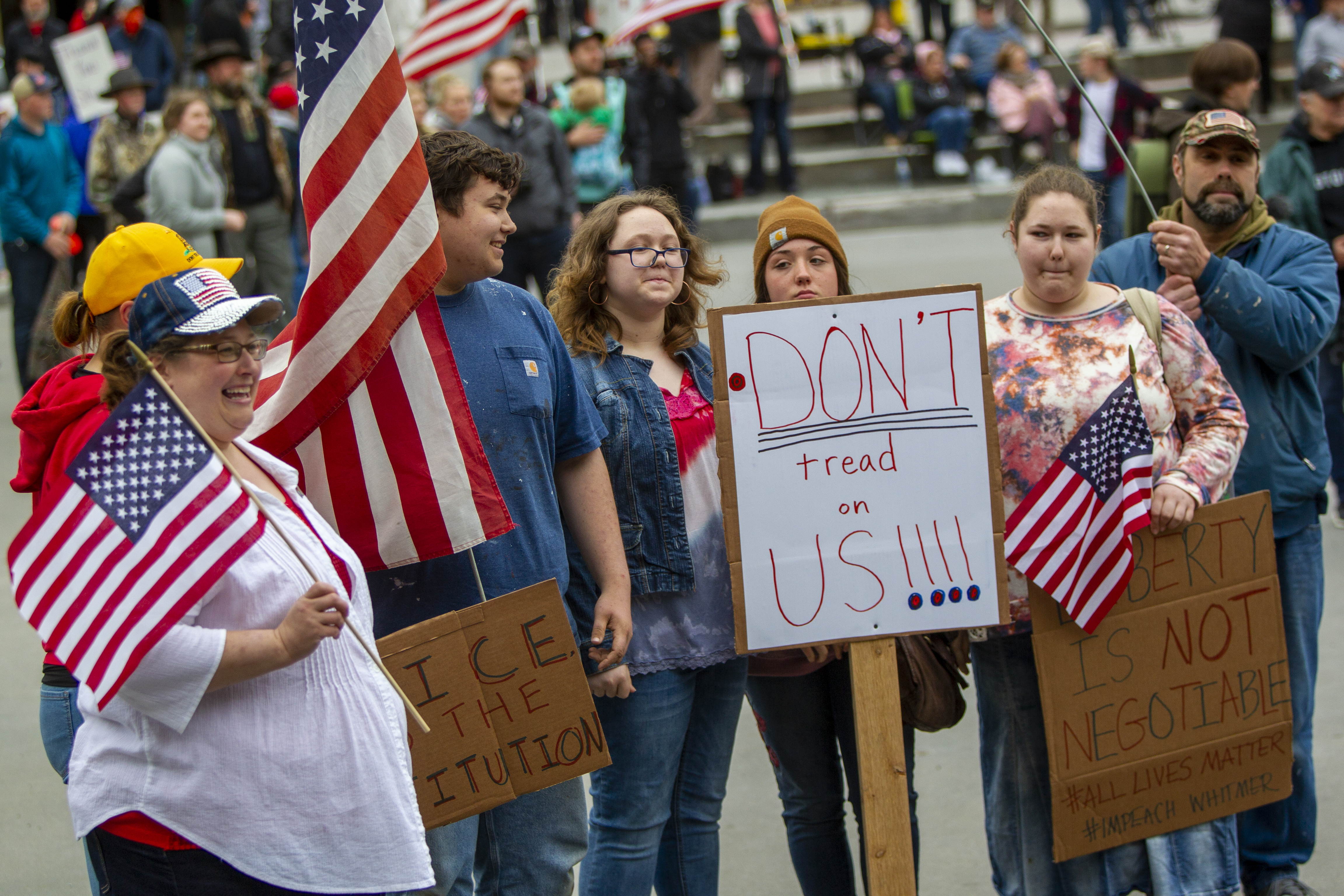 A crowd gathers for the "American Patriot Rally-Sheriffs speak out" event at Rosa Parks Circle in downtown Grand Rapids on Monday, May 18, 2020. The crowd is protesting against Gov. Gretchen Whitmer's stay-at-home order. (Cory Morse | MLive.com)