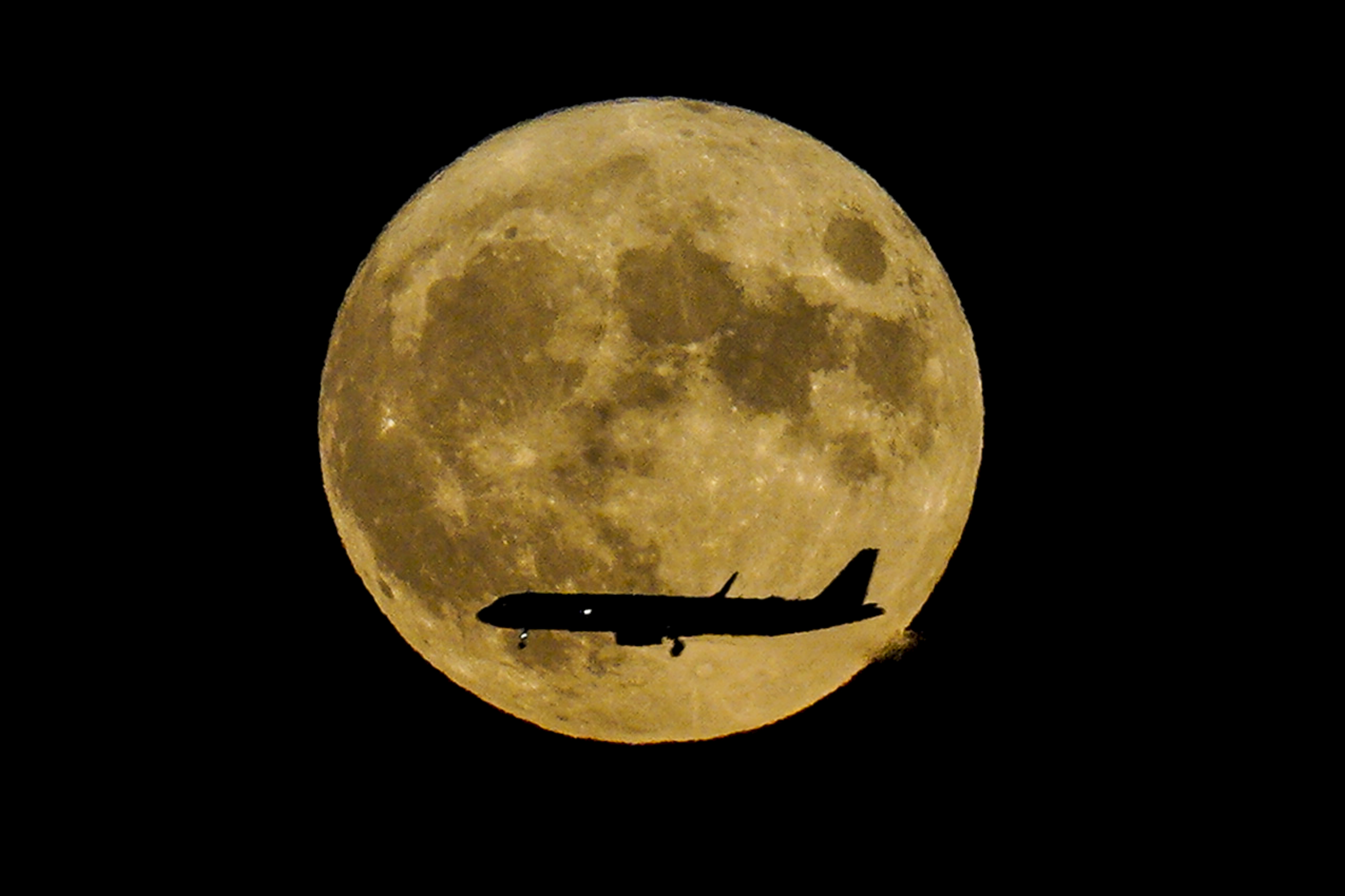 Supermoon puts on a dazzling display across the world