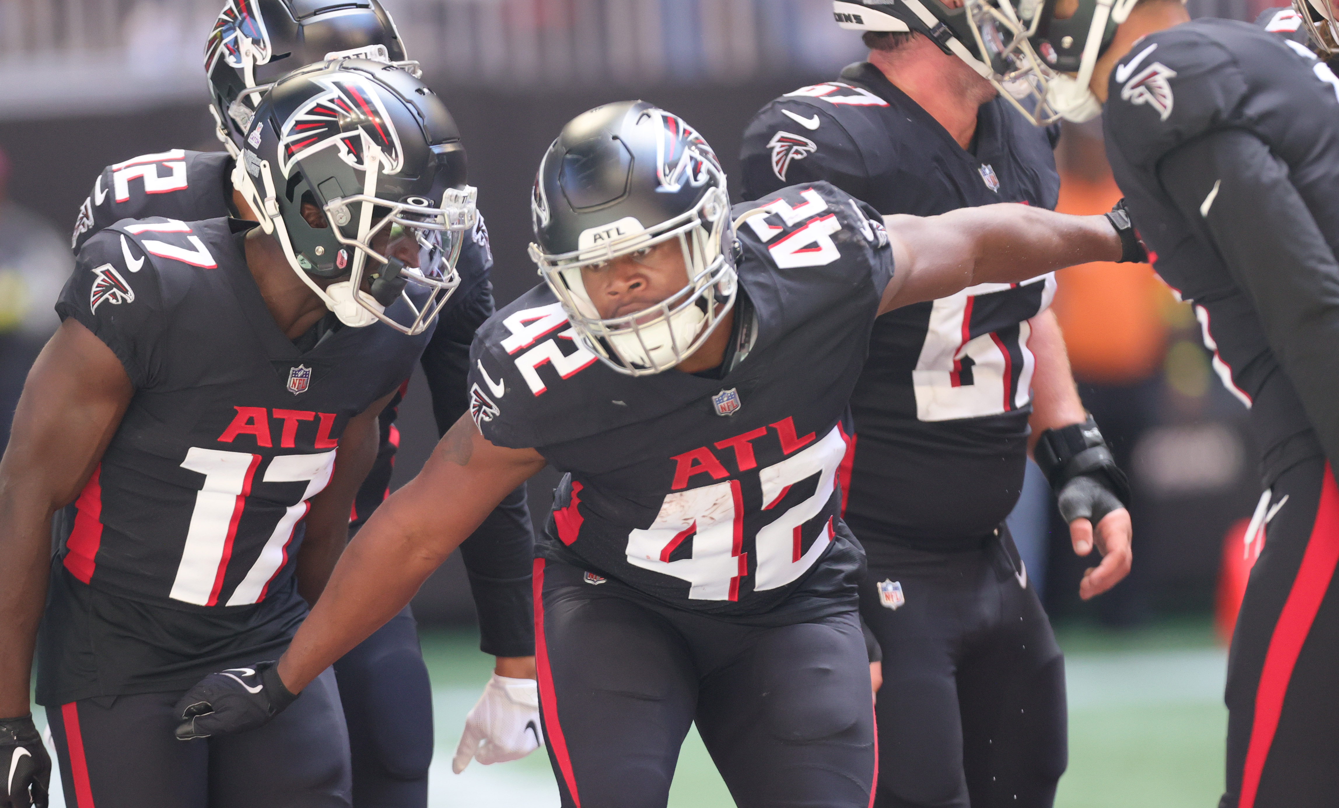 Atlanta Falcons running back Caleb Huntley (42) runs against the