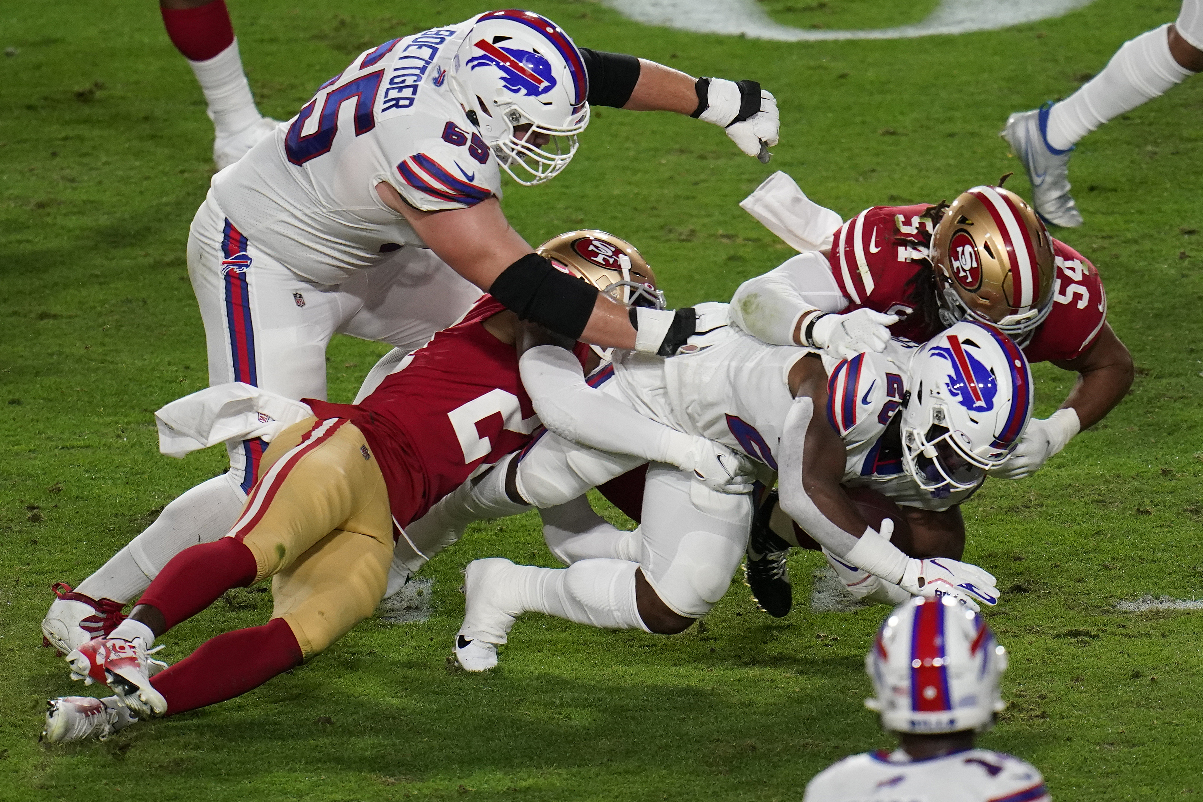 Buffalo Bills guard Ike Boettger (65) and New England Patriots