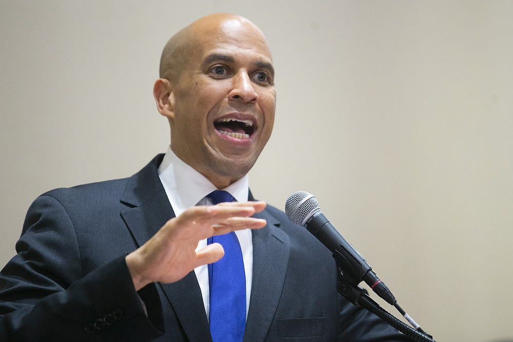 Booker says he's often stopped by TSA for carrying his shaving