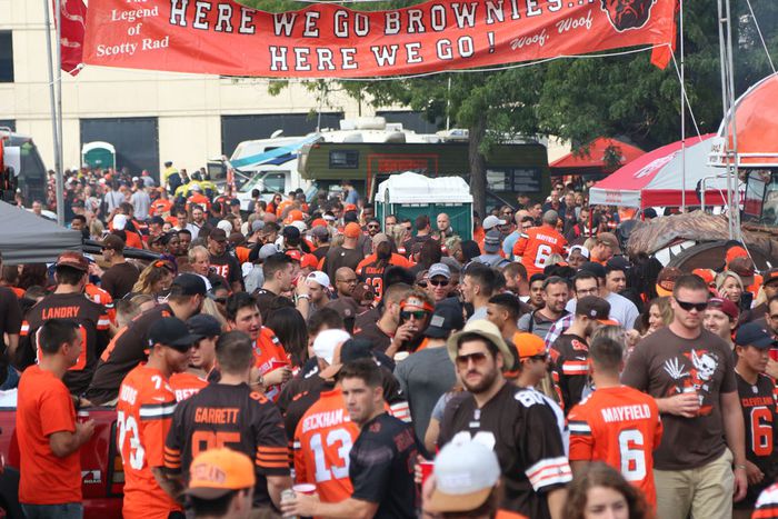 Cleveland Browns football fans enjoy pre-game tailgating parties in  downtown Cleveland, Ohio, USA Stock Photo - Alamy