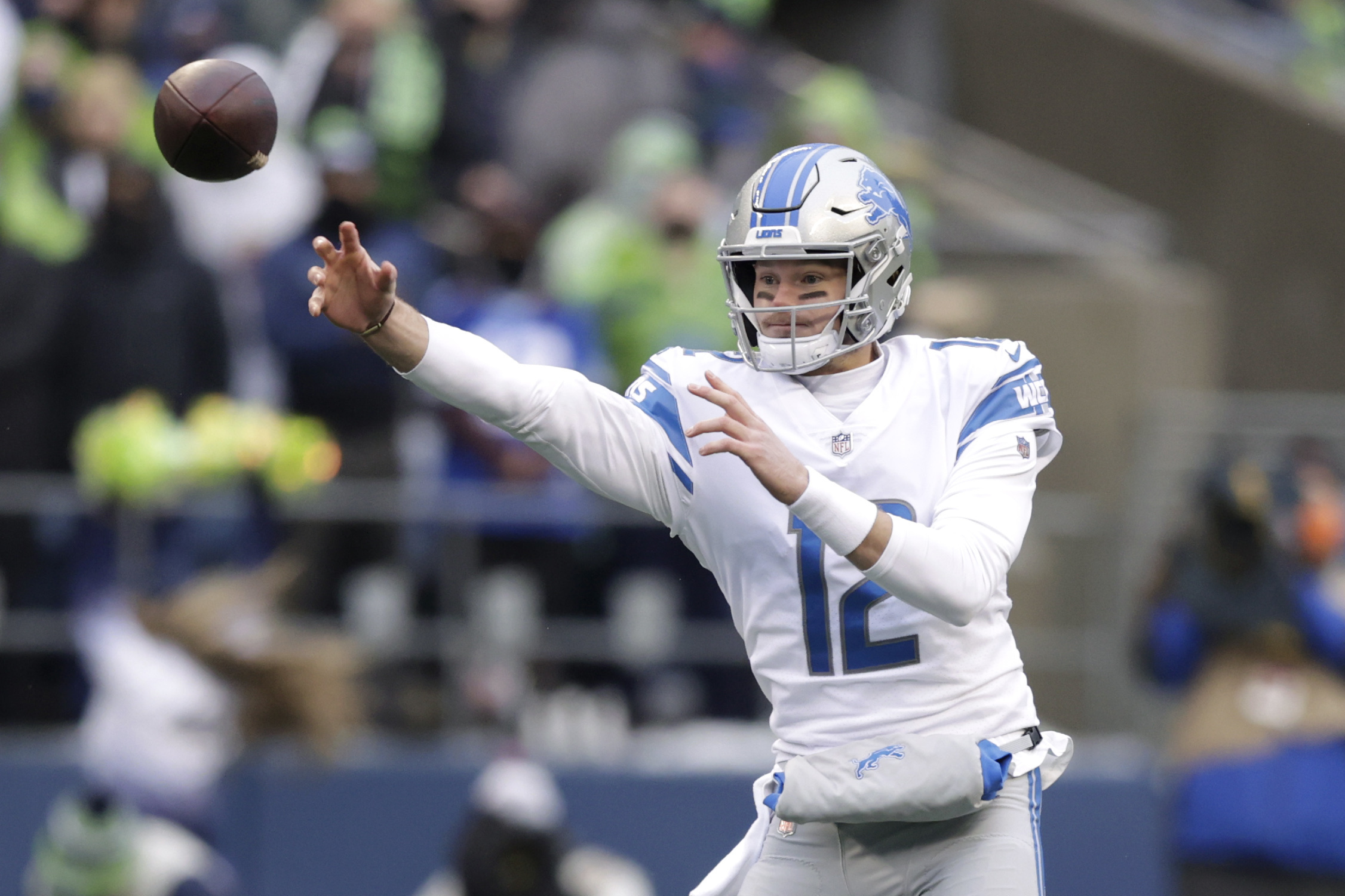 Seattle Seahawks quarterback Russell Wilson and wide receiver DK Metcalf  celebrate a touchdown during an NFL football game against the Detroit  Lions, Sunday, Jan. 2, 2022, in Seattle. The Seahawks won 51-29. (