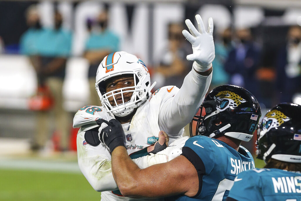 Dolphins place DT Raekwon Davis on IR with knee injury - The San