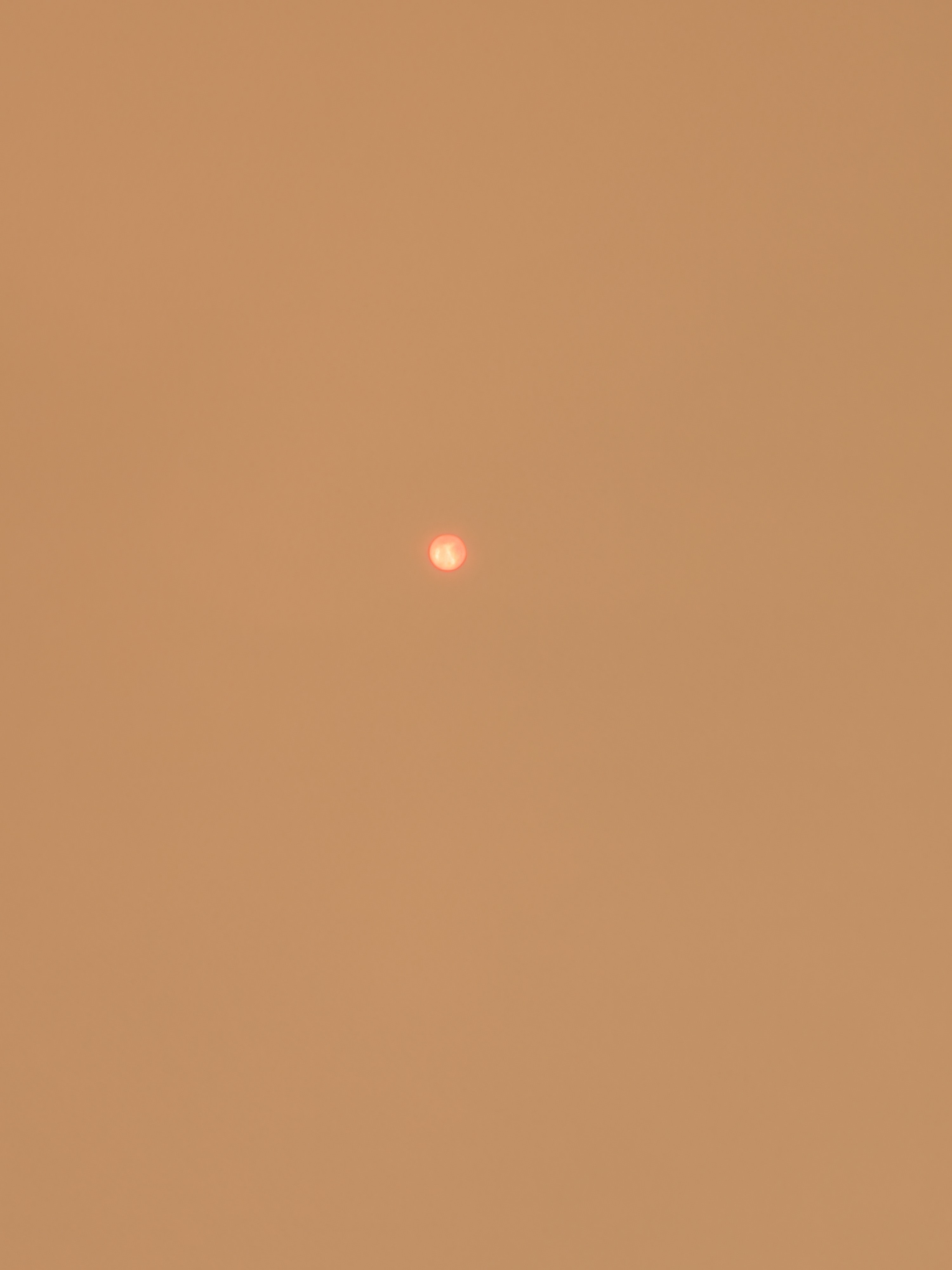 Wildfire smoke blankets Central New York in an orange haze