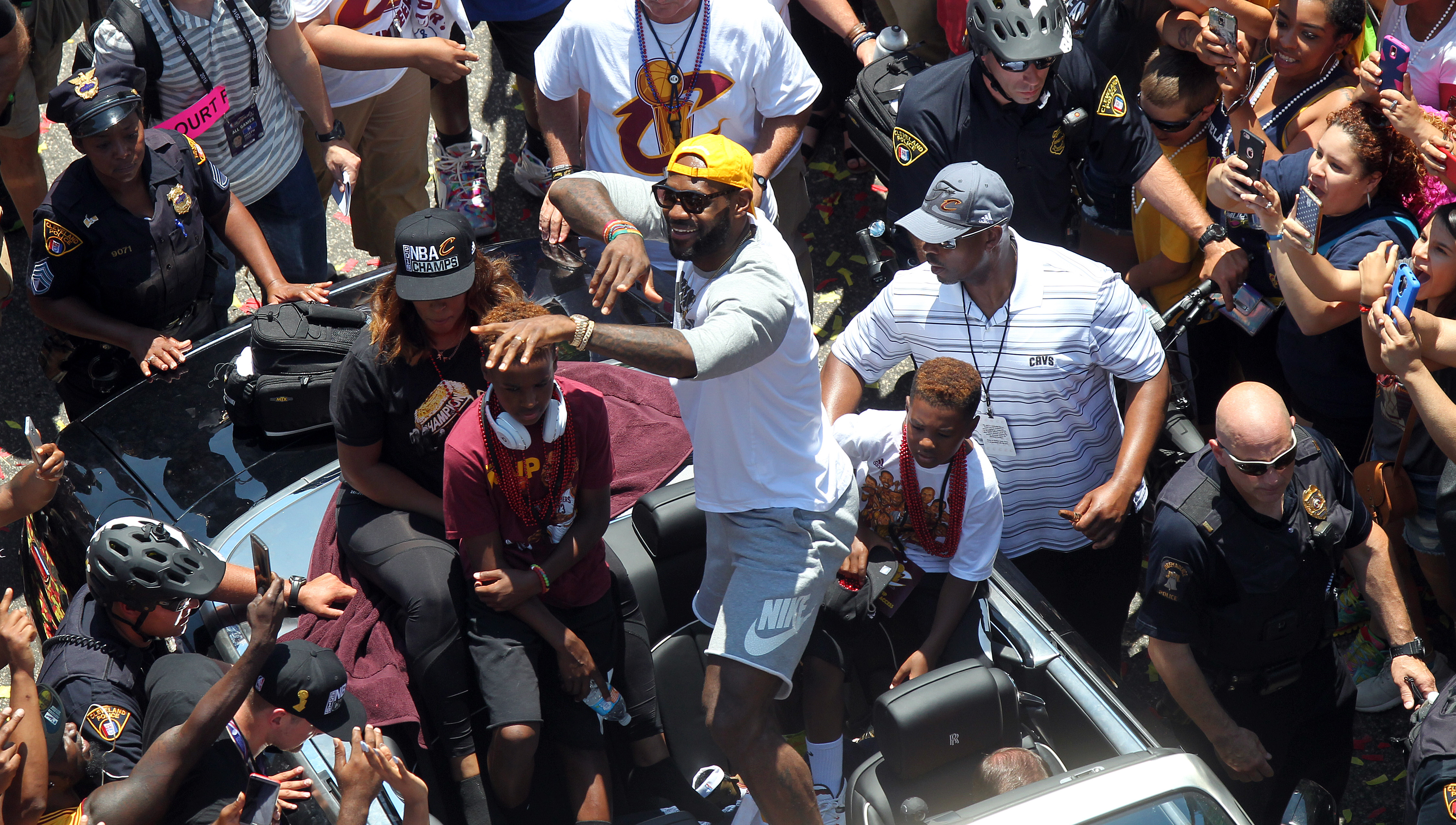 Cleveland Cavaliers forward LeBron James points to the fans during a parade in downtown Cleveland to celebrate and honor the 2016 NBA Champion Cleveland Cavaliers.    Joshua Gunter, cleveland.com June 22, 2016. Cleveland. 