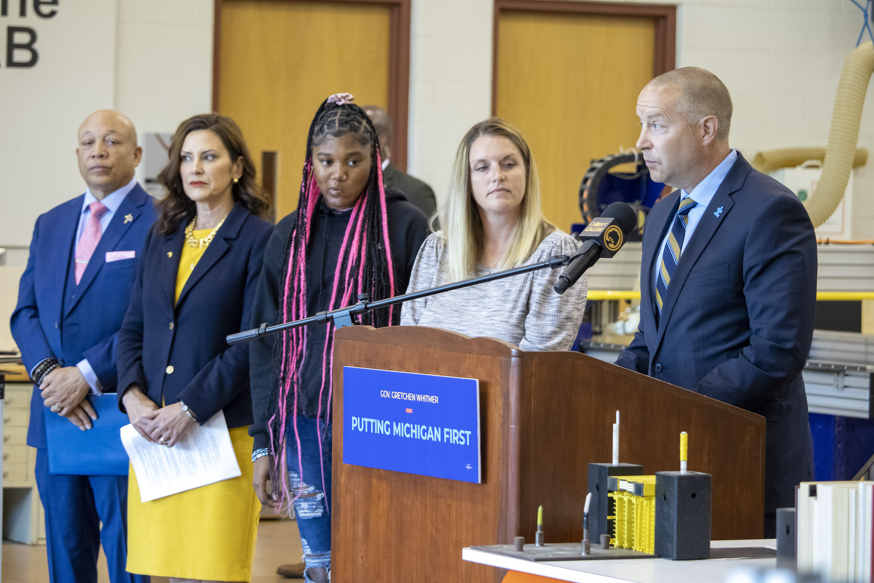 Gov. Gretchen Whitmer signs the state's education budget at Mott