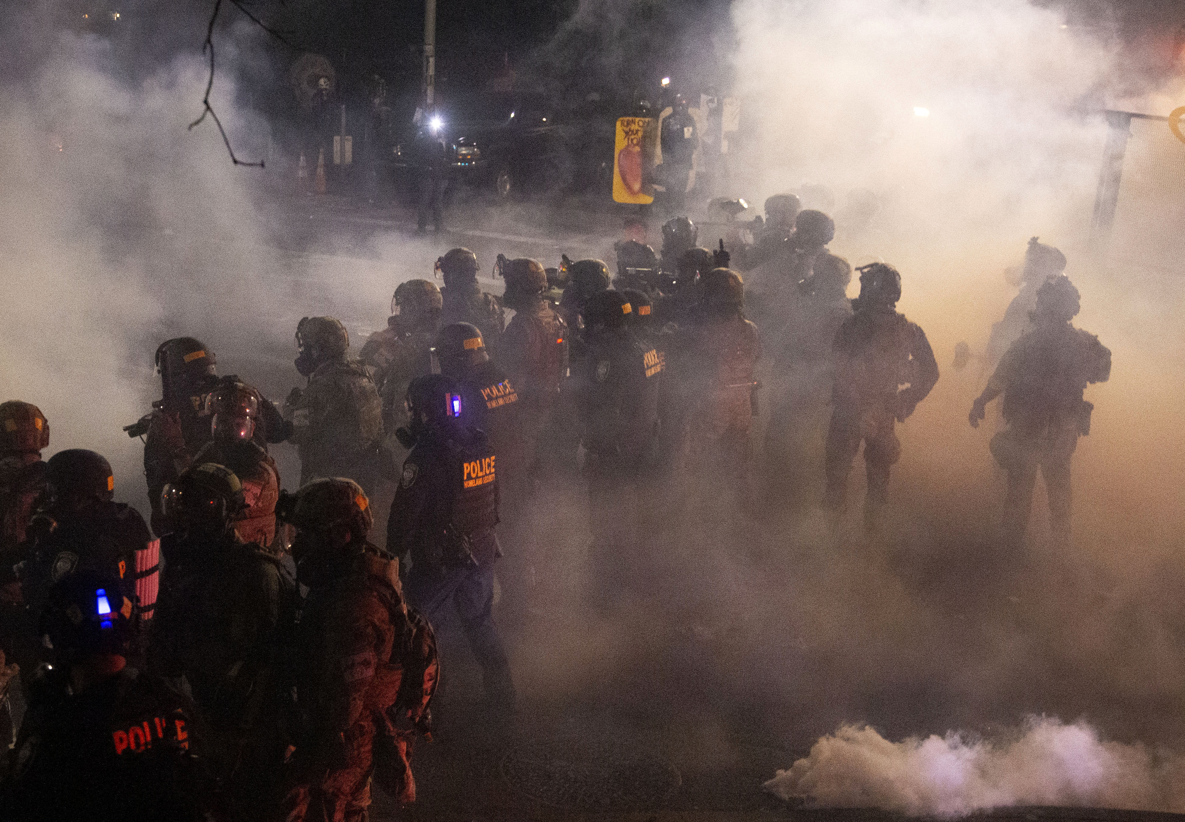 Dramatic scenes play out in the early morning hours of a declared disturbance on the 57th night of protest in Portland, July 23, 2020. Beth Nakamura/Staff