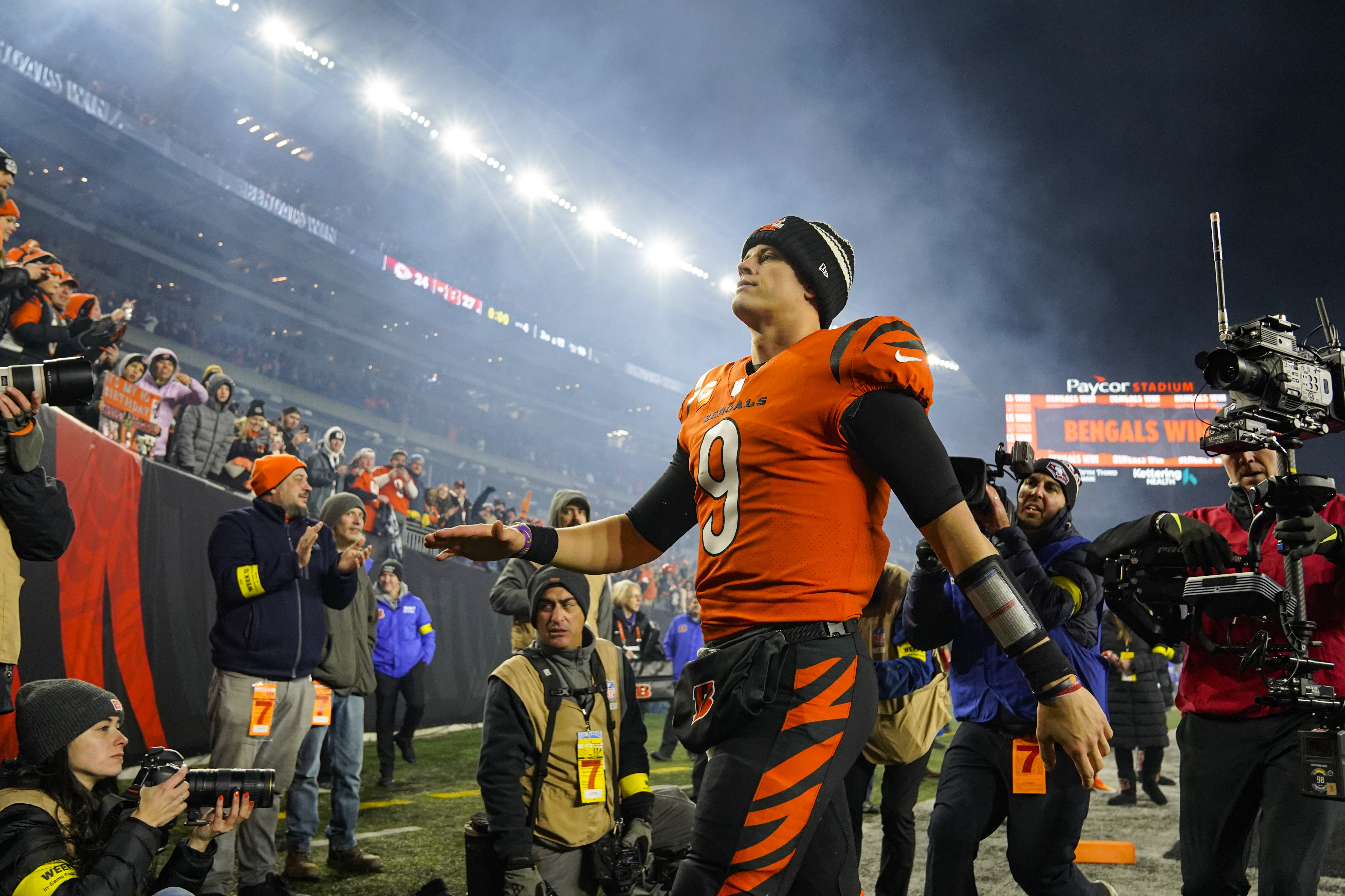 Cincinnati Bengals running back Chris Evans (25) and offensive tackle  D'Ante Smith (70) celebrate after Evans scored a touchdown during the  second half of an NFL football game, Sunday, Jan. 9, 2022