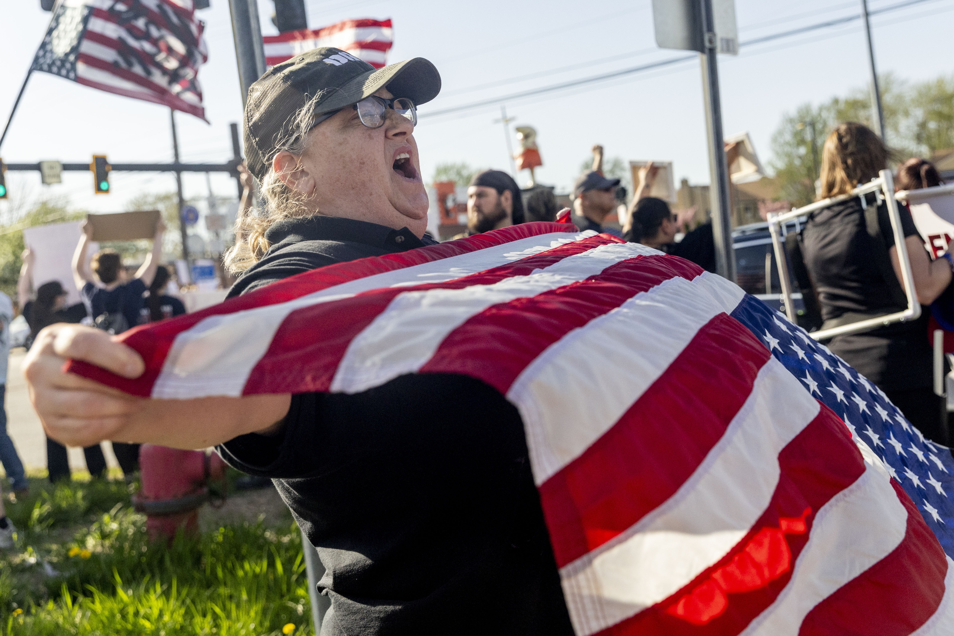 Thousands protest President Trump outside Michigan rally - mlive.com