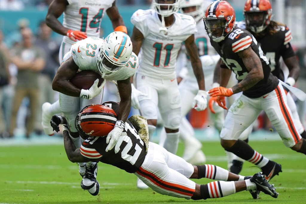 Jeff Wilson Jr. of the Miami Dolphins celebrates with Raheem Mostert after  scoring a touchdown in the second quarter of the game against the Green Bay  Packers at Hard Rock Stadium on