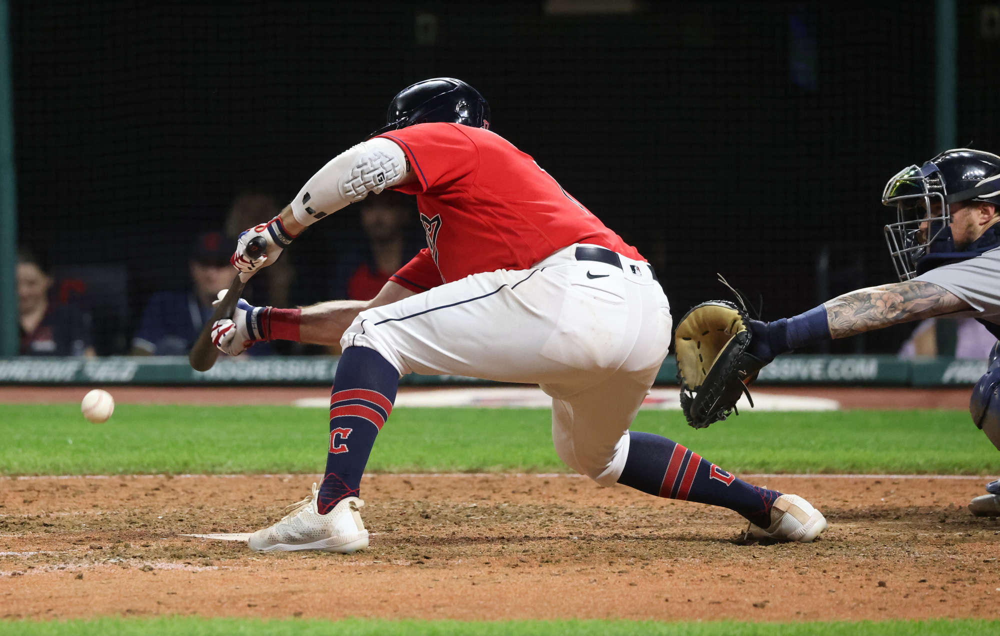 Cleveland Guardians third baseman Tyler Freeman throws out Detroit