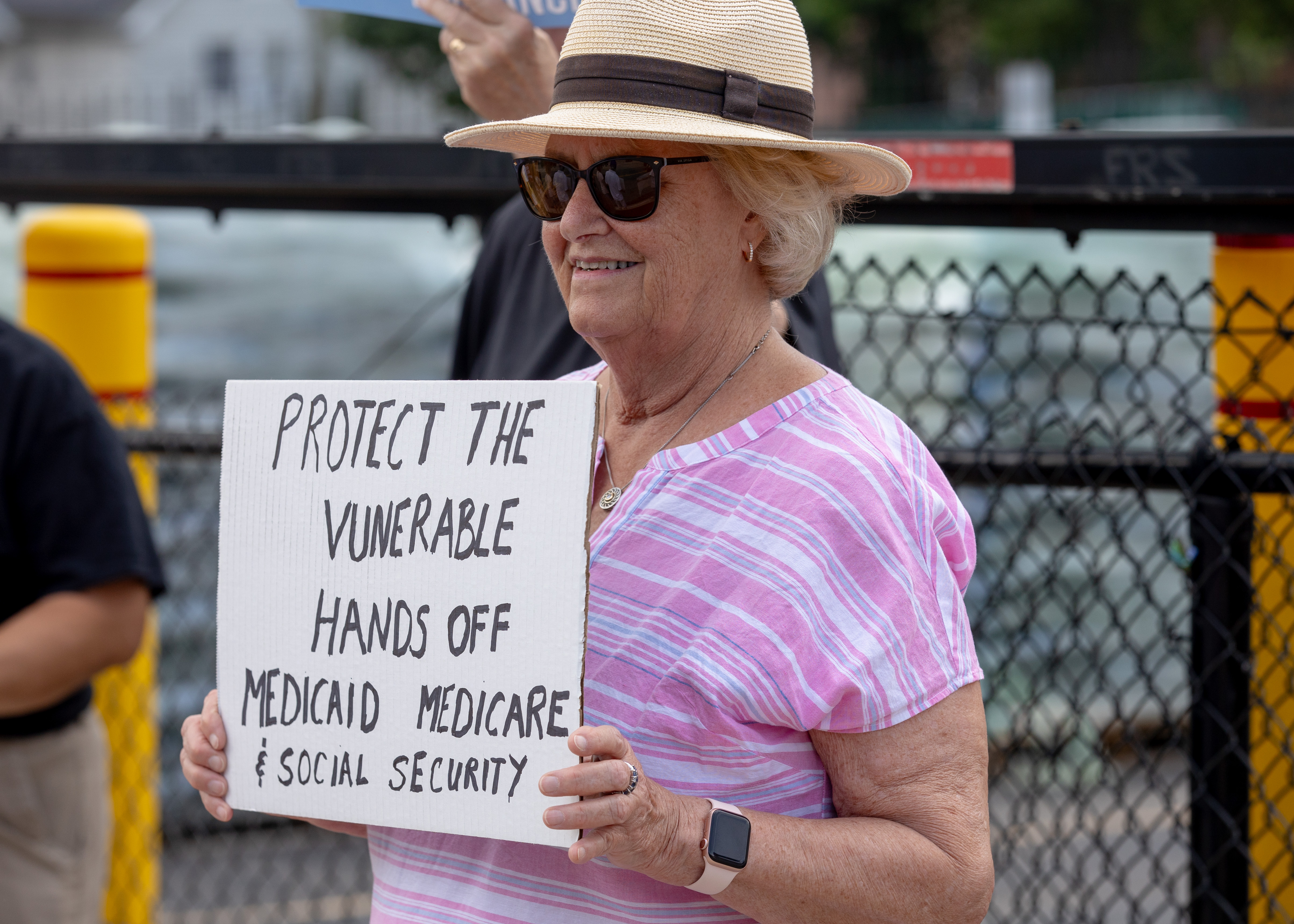 Dozens protest across Rep. Malliotakis' office against cuts - silive.com