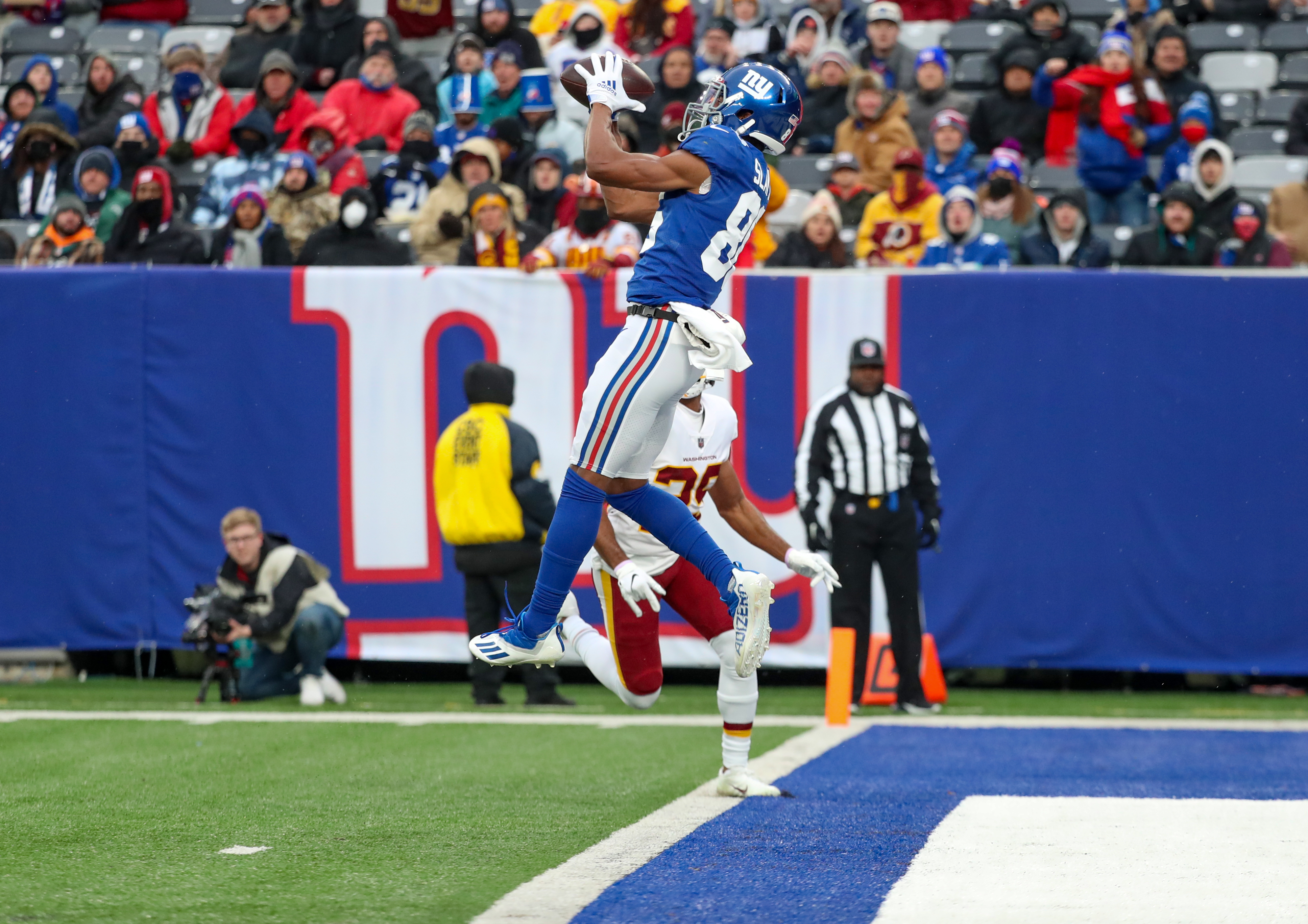 New York Giants wide receiver Darius Slayton (86) catches a pass for a 22-yard touchdown against the Washington Football Team on Sunday, Jan. 9, 2022 in East Rutherford, N.J. Washington won, 22-7.