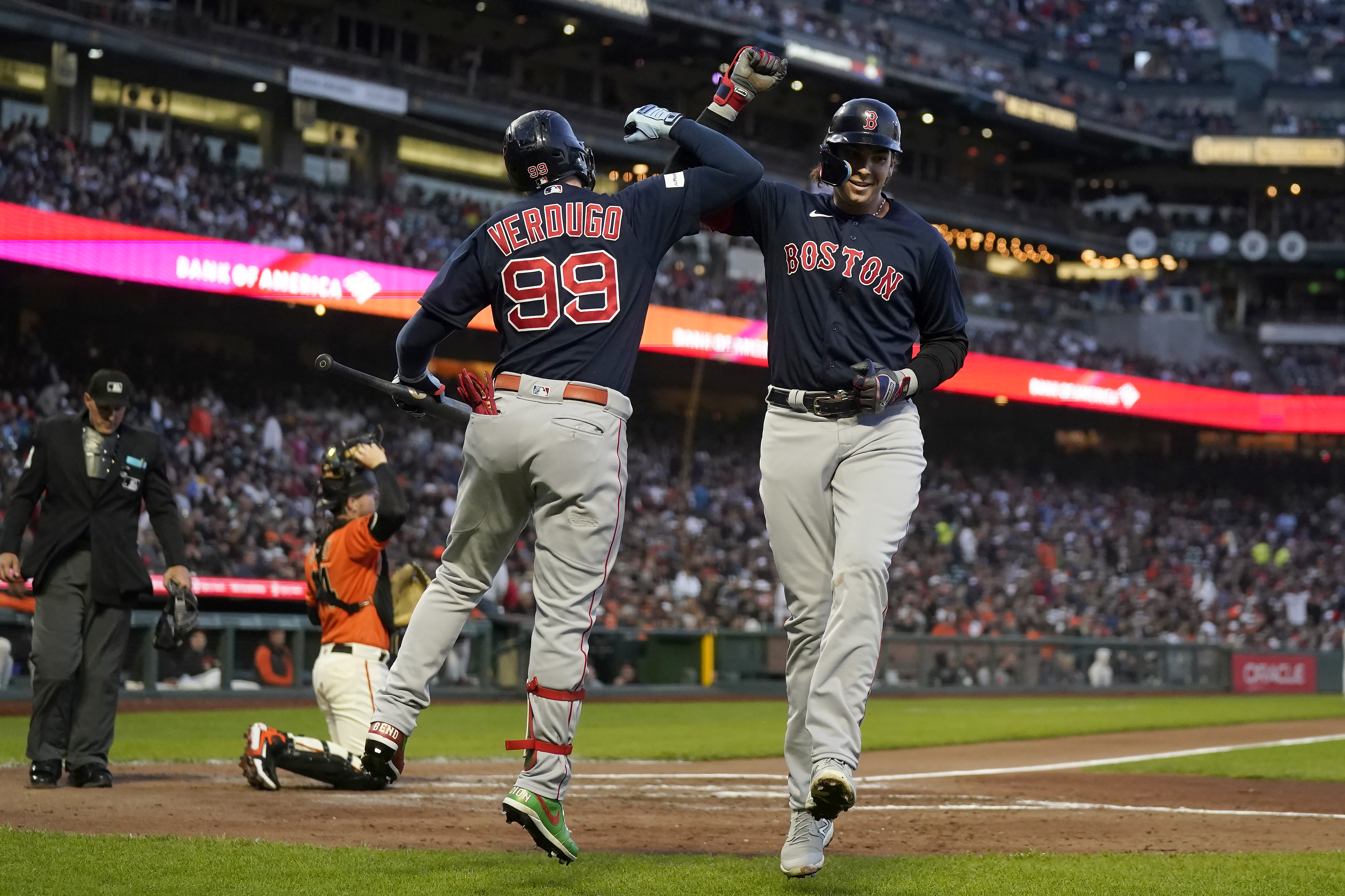 Boston Red Sox 1B Triston Casas, left, reacts to a triple play in