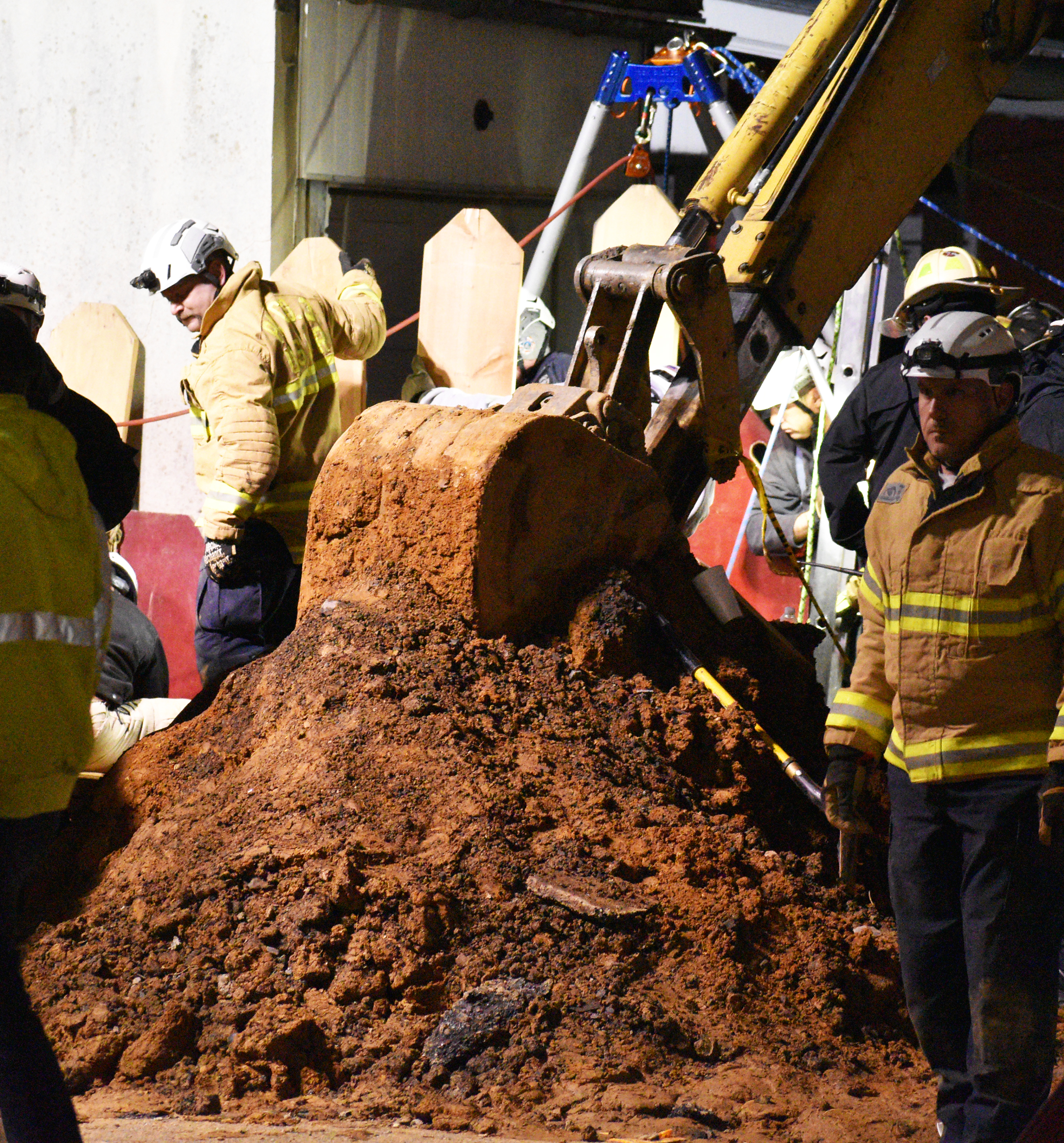 Worker rescued from trench collapse after 8 hours as temperatures ...
