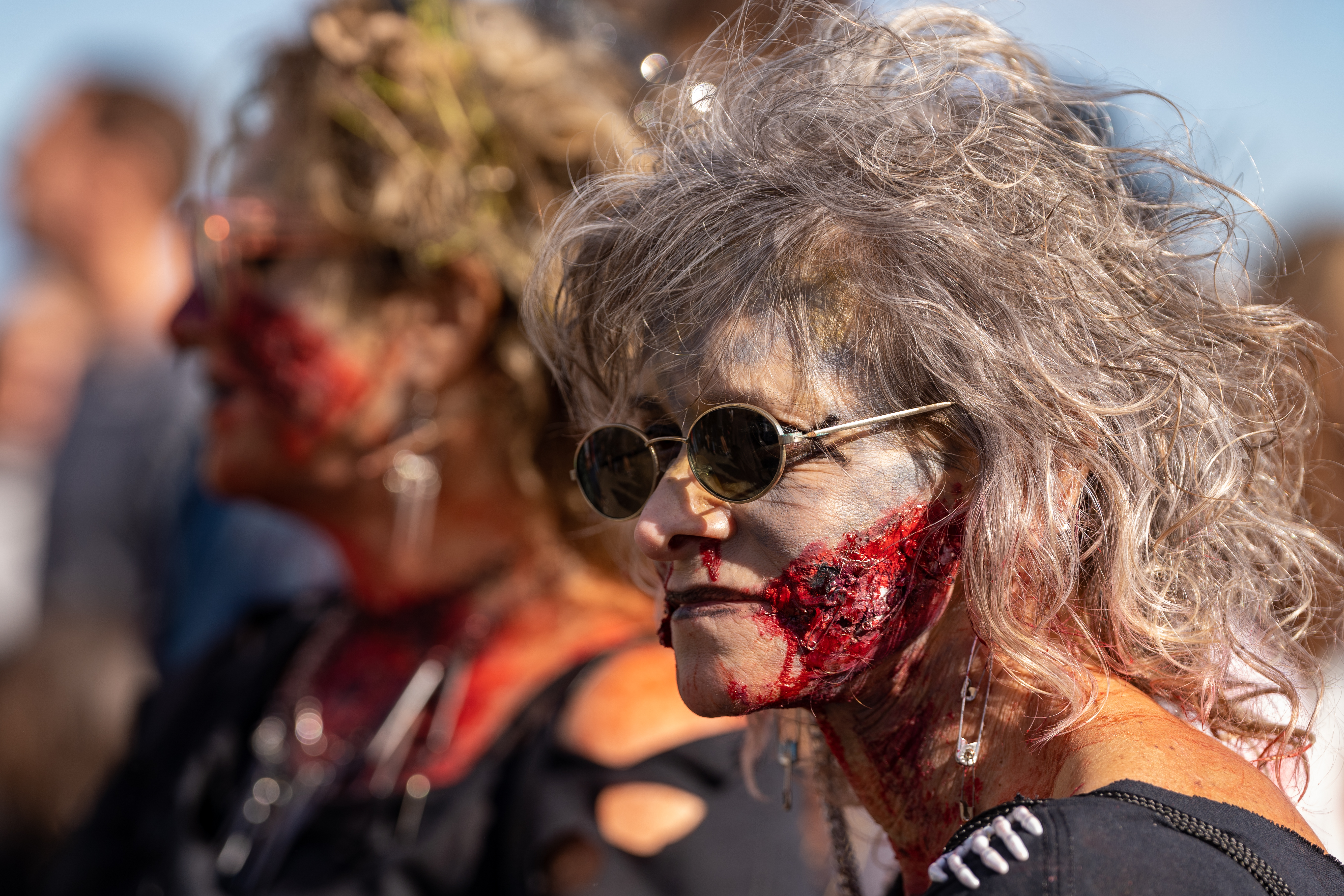Maxine Bodson, from Seaside Heights, participates in the 14th Asbury Park Zombie Walk in Asbury Park on Saturday, October 8, 2022. The zombie walk held its first themed year with the theme being 80's and 90's punk and metal.