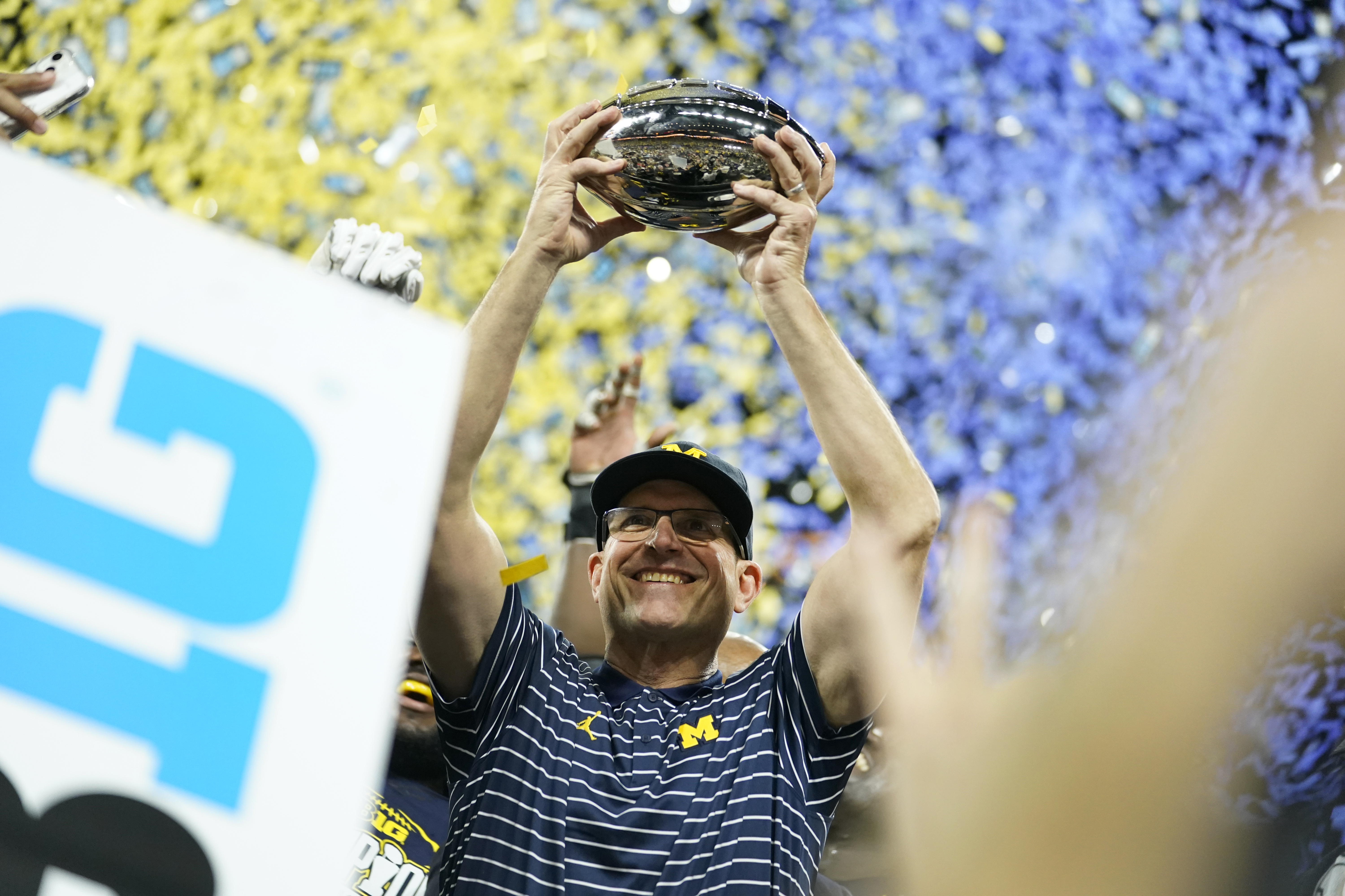 Jim Harbaugh stays in Michigan