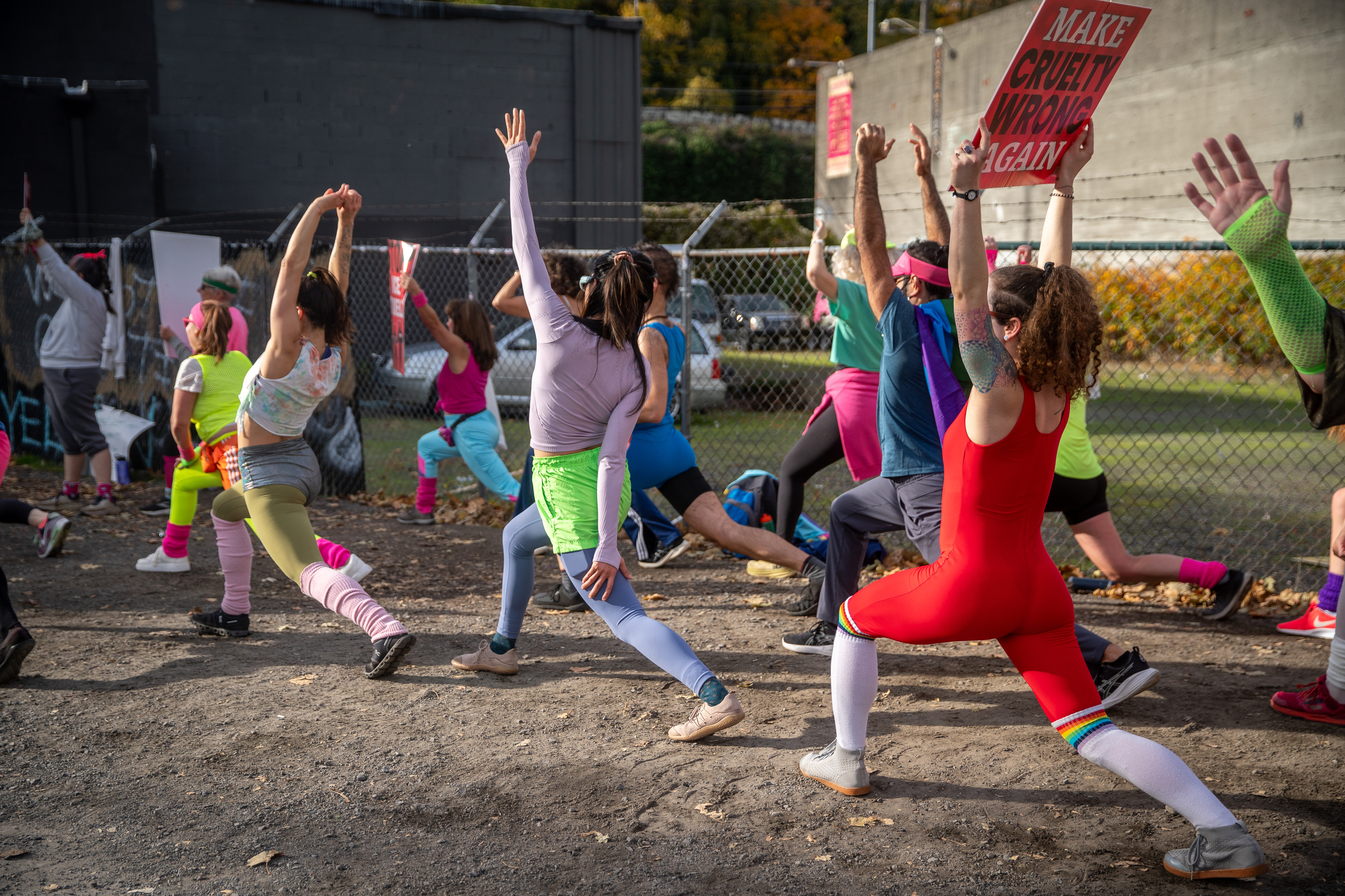 Participants in Fulcrum Fitness’s “Sweatin’ Out the Fascists” held an ’80s-aerobics peaceful protest outside the U.S. Immigration and Customs Enforcement (ICE) facility in South Portland on Sunday, Nov. 9, 2025, collecting donations for the Oregon Food Bank.