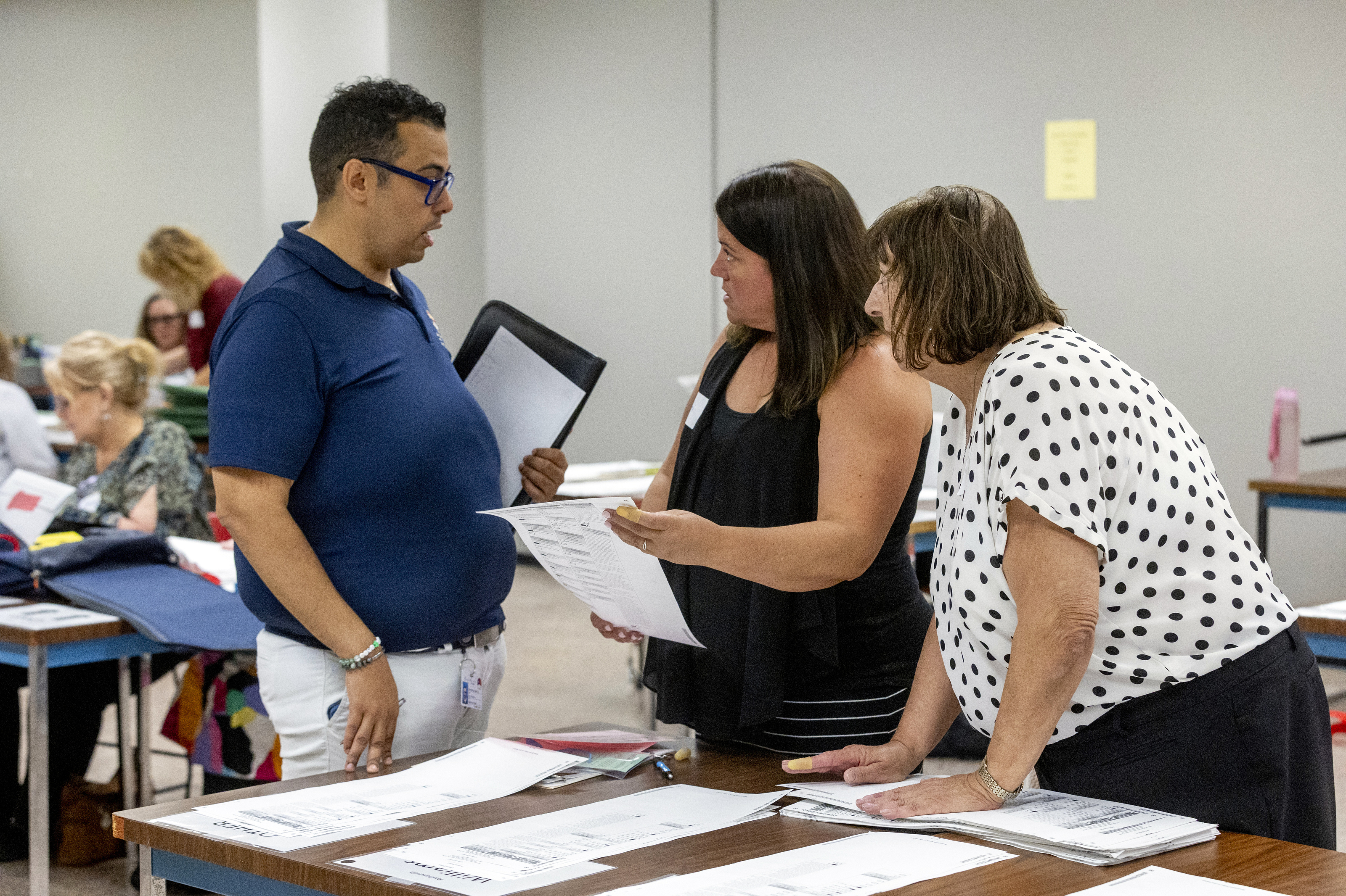Election workers recount votes for two Genesee County ballots - mlive.com