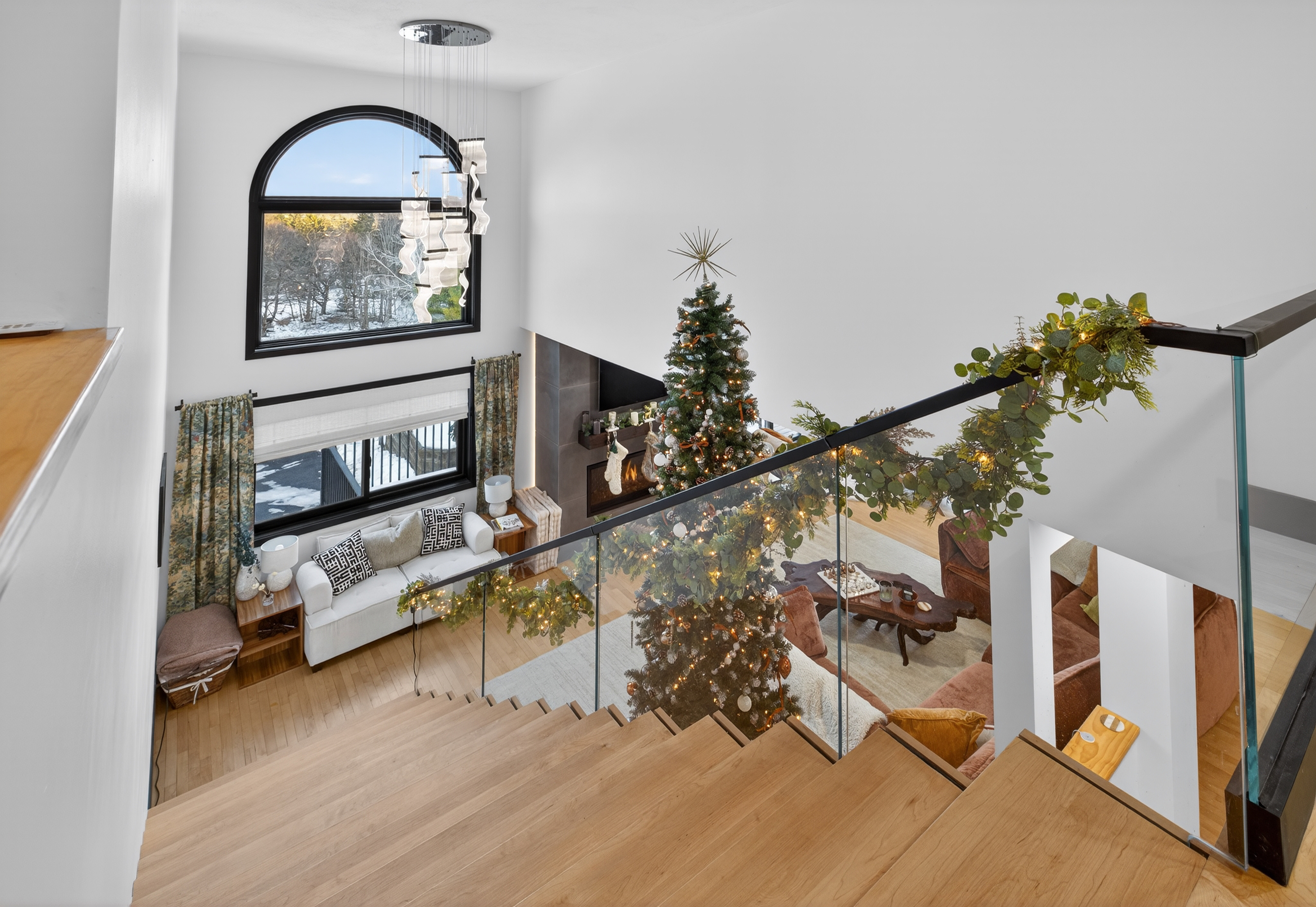 - Christina Cianciosi grew up admiring the house at 101 Alton Street in Syracuse which borders Bellevue Country Club. In 2022, she bought the unique home and gave it an extensive renovation. The railing of the floating staircase was decorated beautifully for the holidays. Courtesy of Kyle Fedrizzi, owner of kfotography315, LLC.