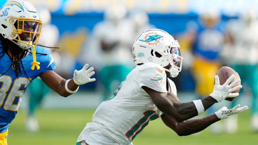 Tyreek Hill Miami Dolphins Unsigned Celebrates a Touchdown Photograph