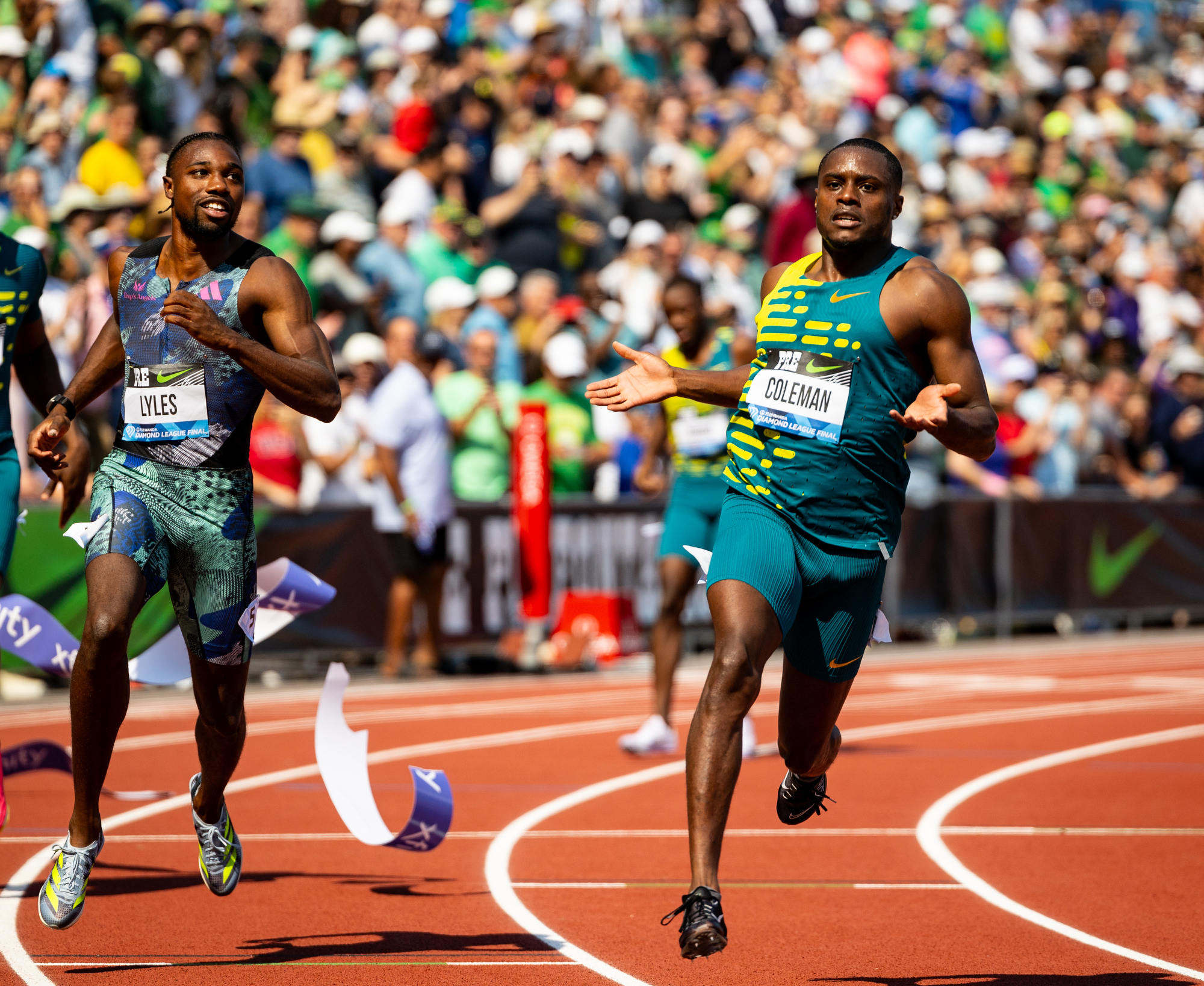 Christian Coleman of the United States beats Noah Lyles (left) to win the men’s 100 meters at the Prefontaine Classic track and field meet on Saturday, Sept. 16, 2023, at Hayward Field in Eugene.