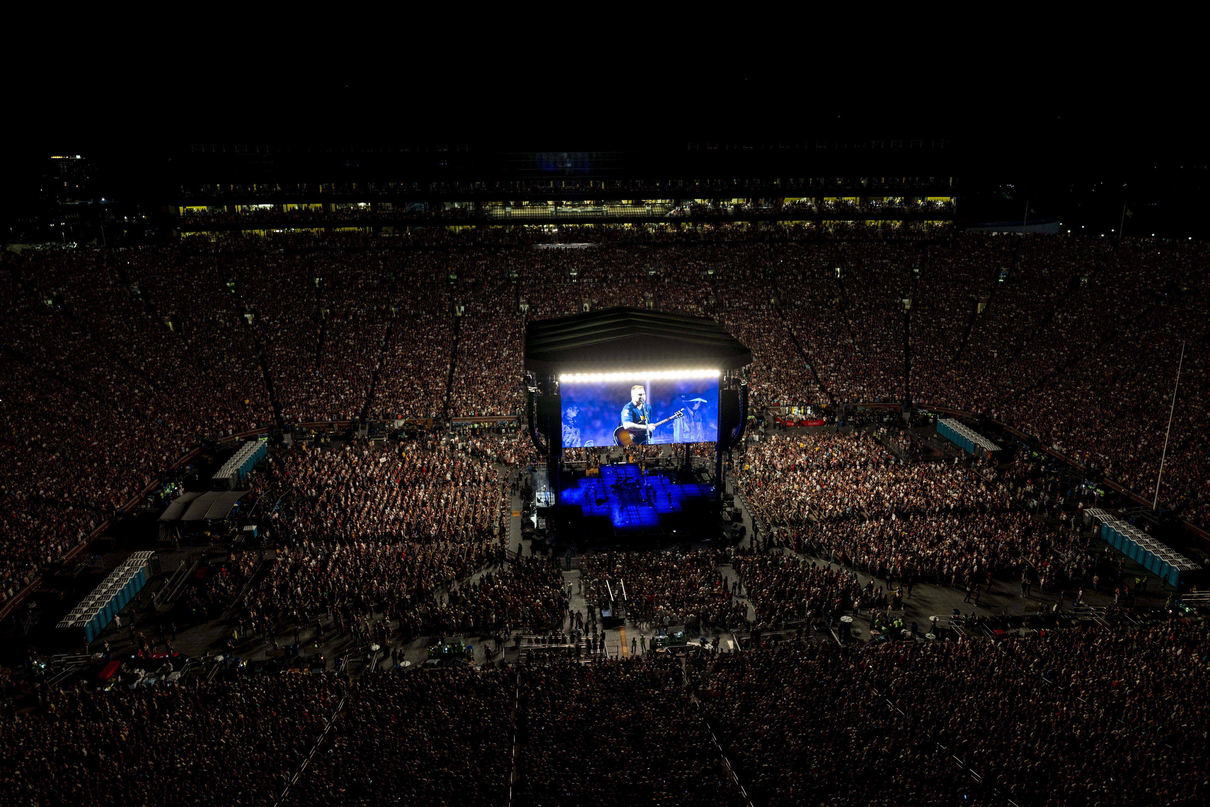 Zach Bryan, John Mayer concert packs Michigan Stadium with record