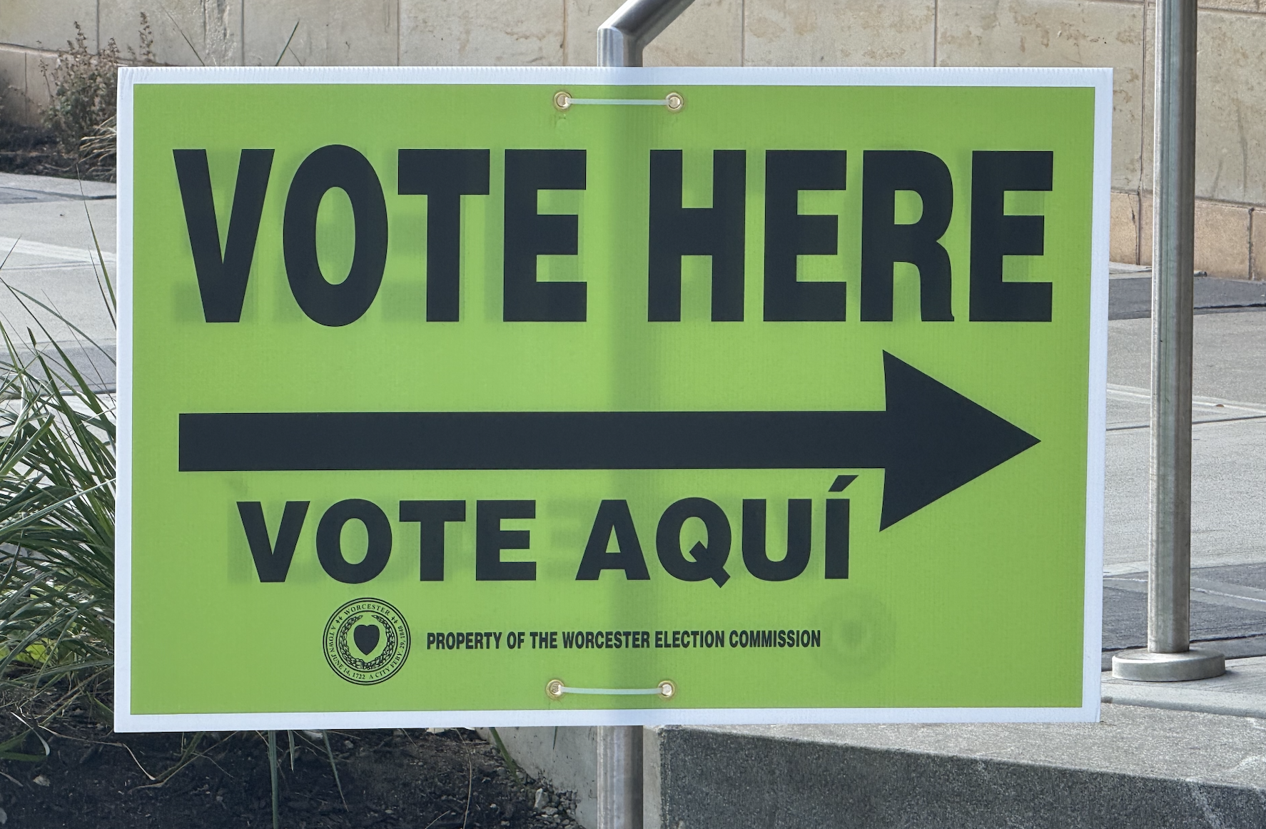 A vote here sign outside of the Worcester Public Library.