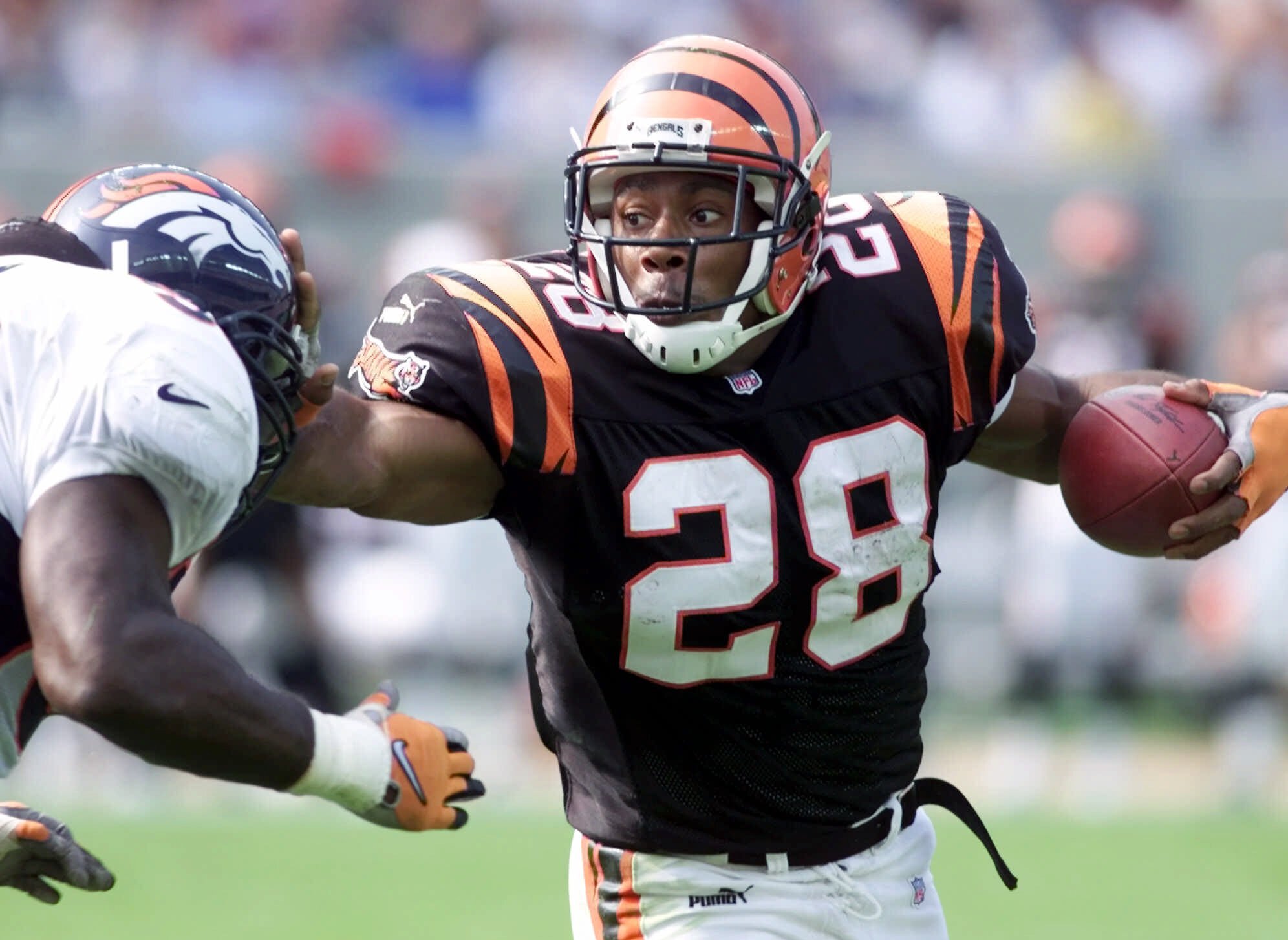 Wide receiver Isaac Curtis of the Cincinnati Bengals is tackled by