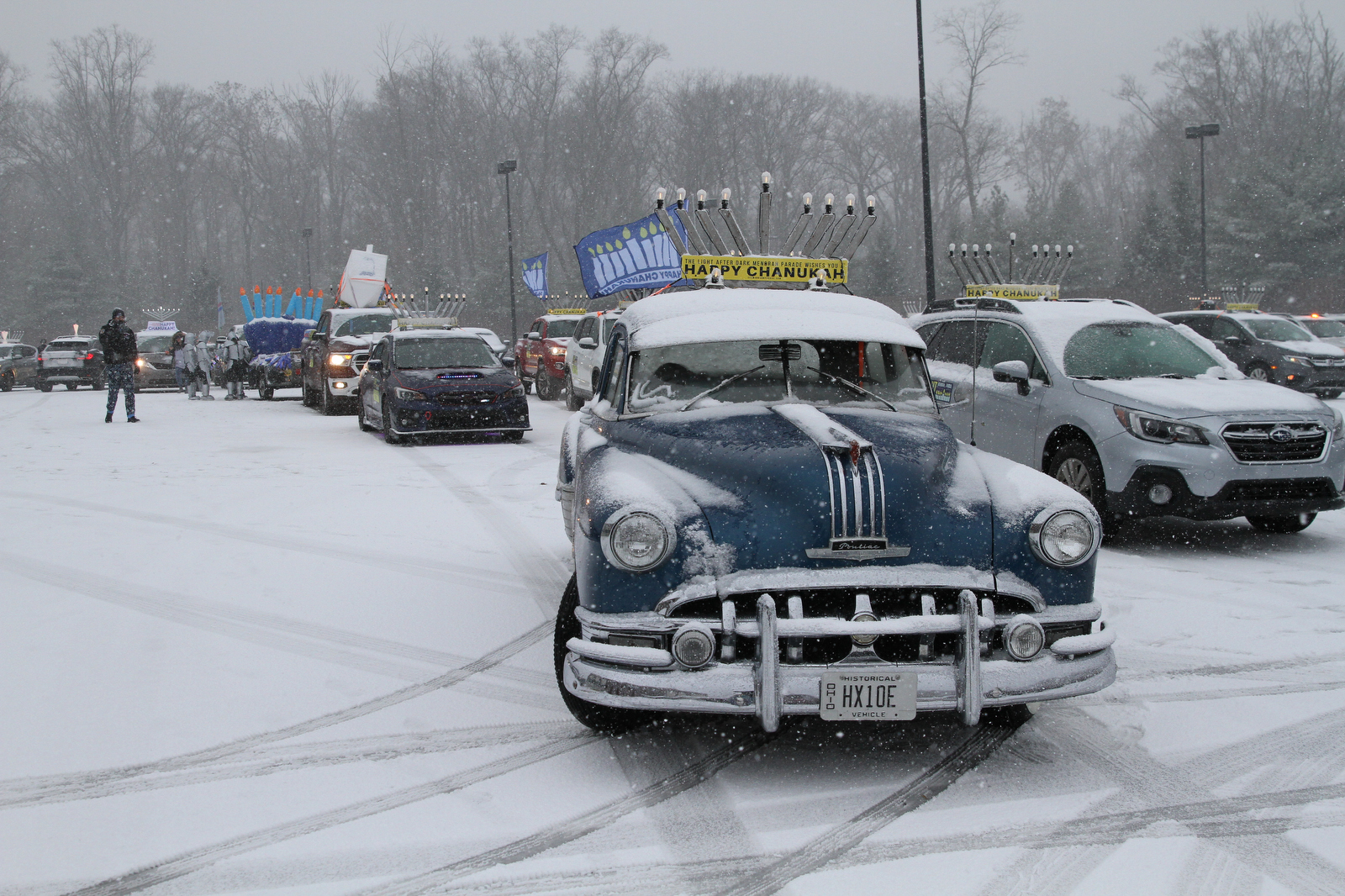 Menorahtopped cars parade through Cleveland eastern suburbs