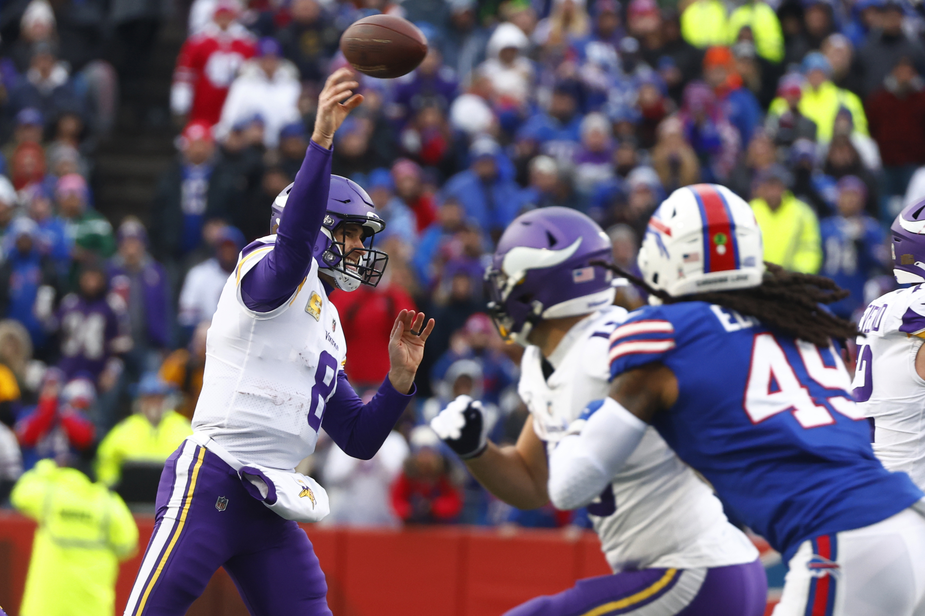 Buffalo Bills wide receiver Stefon Diggs tries to evade Minnesota Vikings  cornerback Andrew Booth Jr. (23) in the second half of an NFL football game,  Sunday, Nov. 13, 2022, in Orchard Park