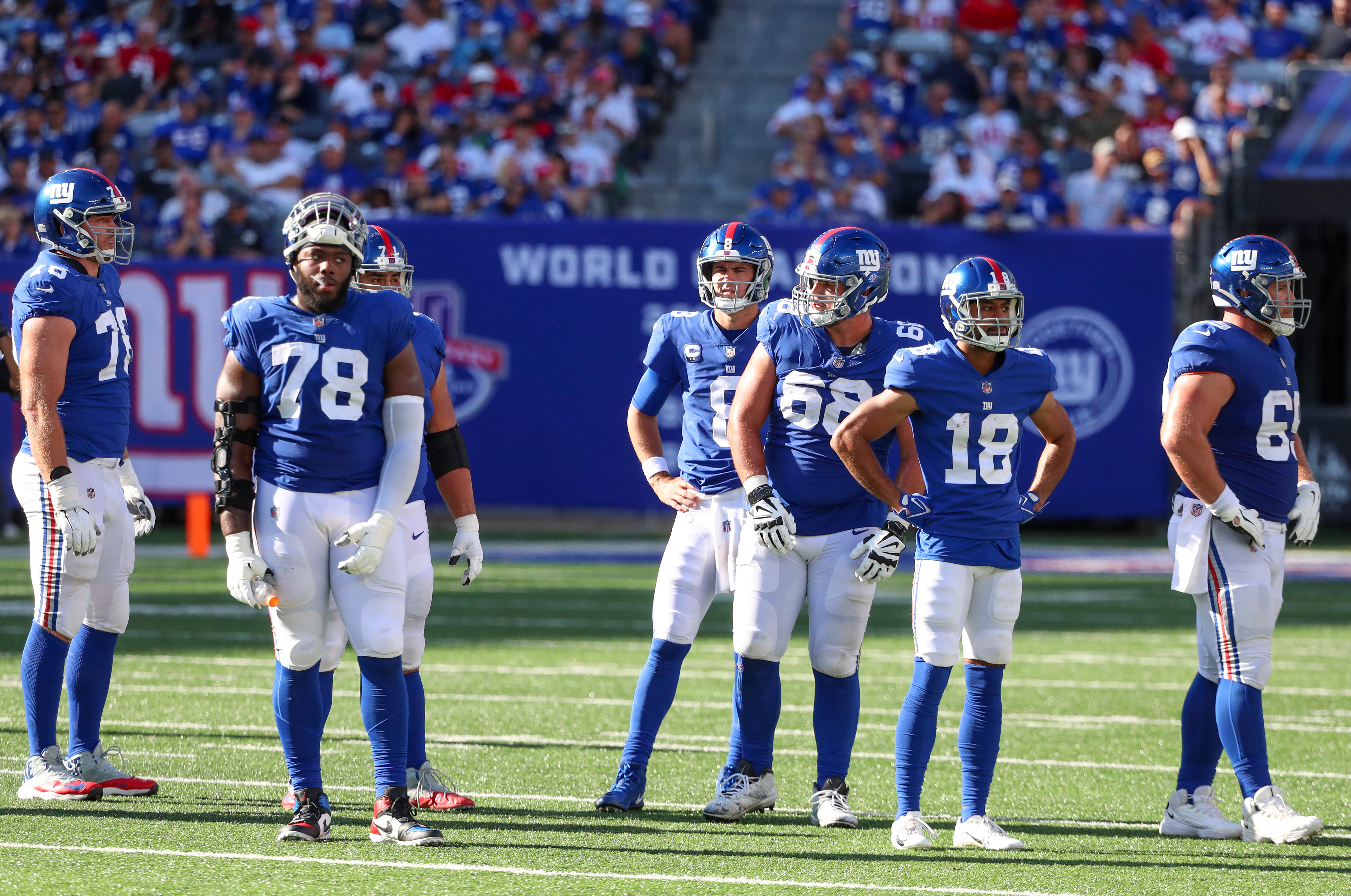 Atlanta Falcons guard Chris Lindstrom (63) on the sideline against