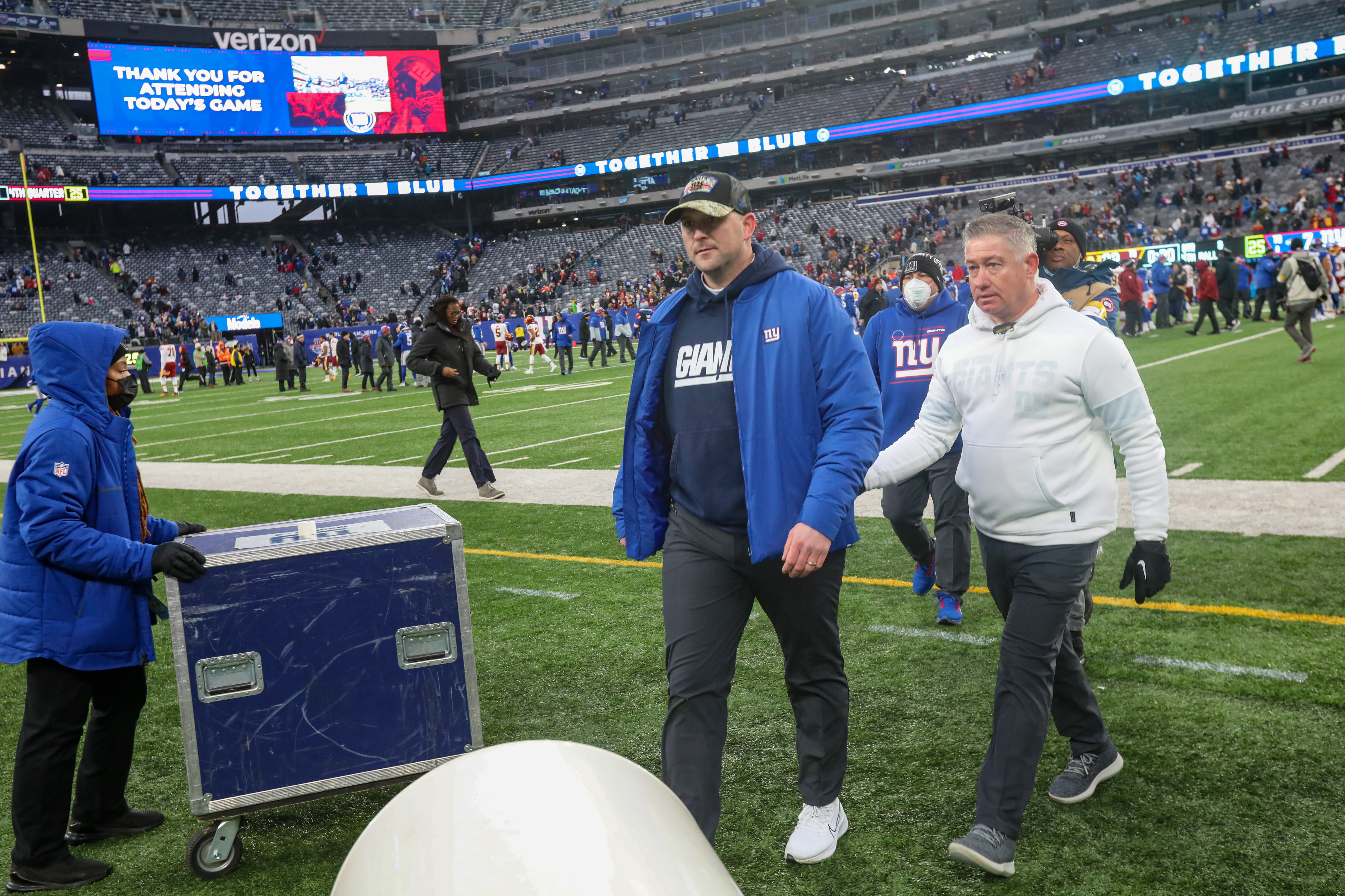 New York Giants head coach Joe Judge (center) walks off after the Giants lost to the Washington Football Team, 22-7, on Sunday, Jan. 9, 2022 in East Rutherford, N.J.