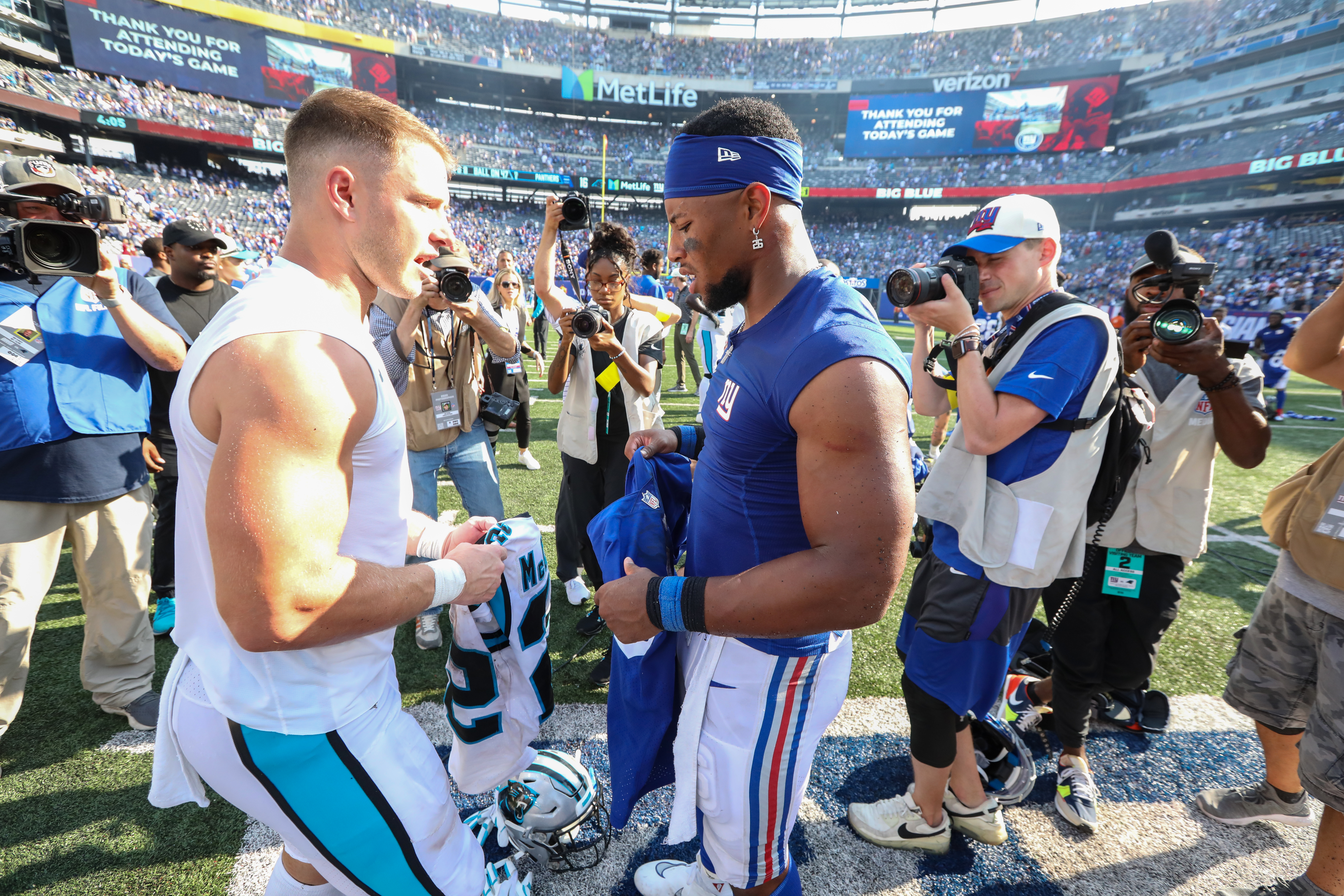 Carolina Panthers' Jeremy Chinn, left, tries unsuccessfully to stop New  York Giants' Daniel Bellinger from scoring a touchdown during the second  half an NFL football game, Sunday, Sept. 18, 2022, in East