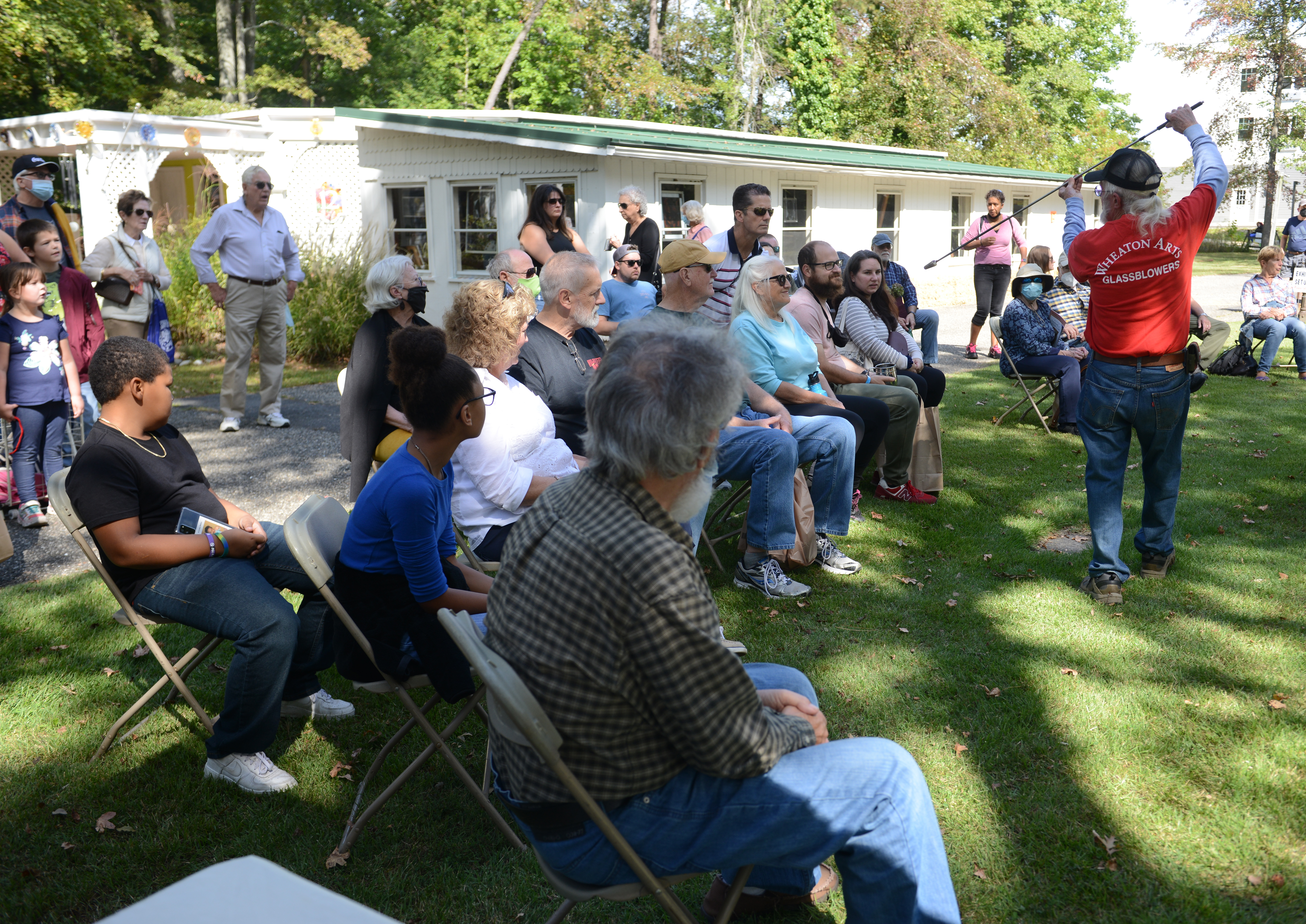 Wheaton arts Traveling Glassblowers give a glass bowling demonstration during the 22nd annual Festival of Fine Craft at Wheaton Arts in Millville, Saturday, Oct. 2, 2021.