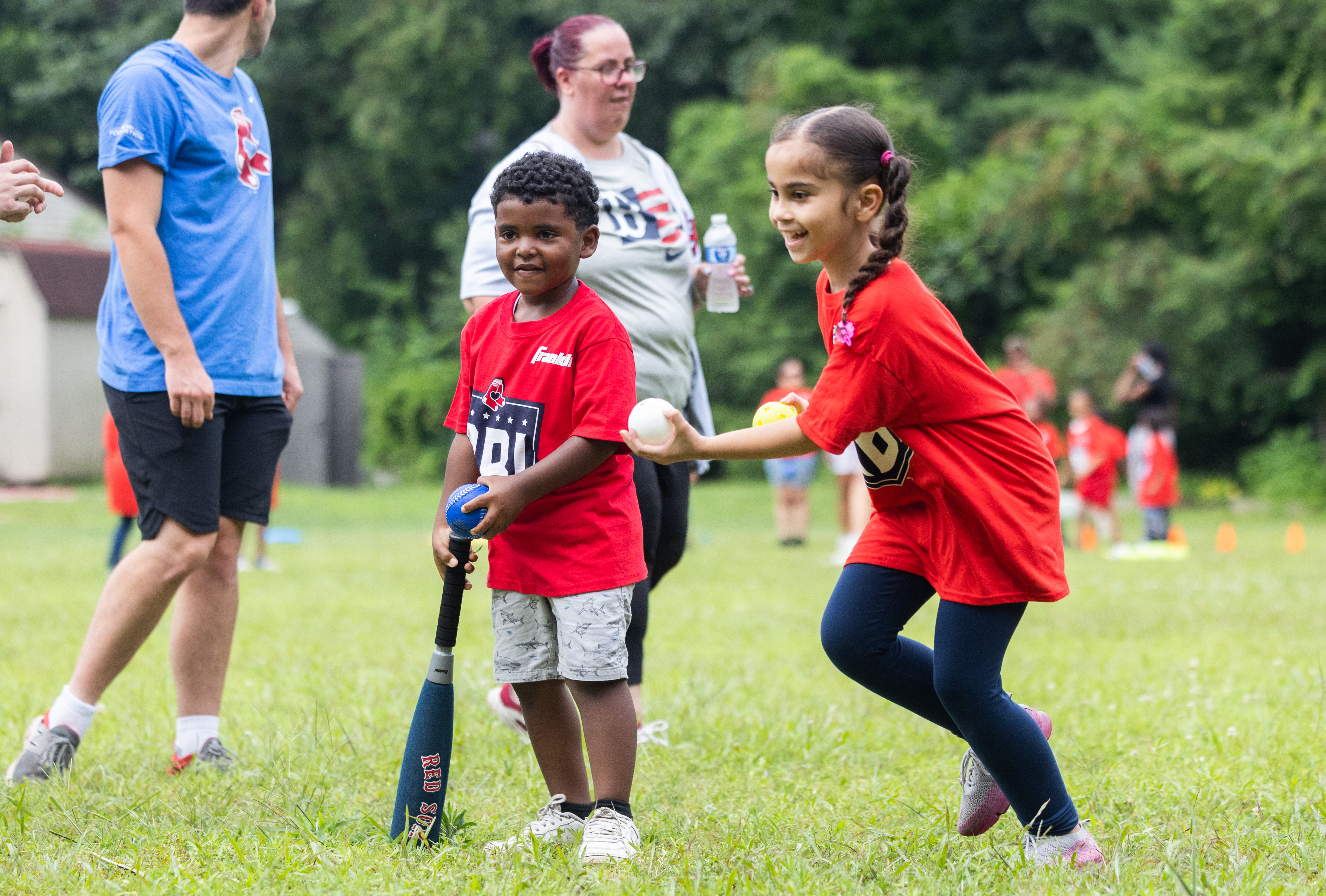 Square One children participate in a baseball & softball clinic