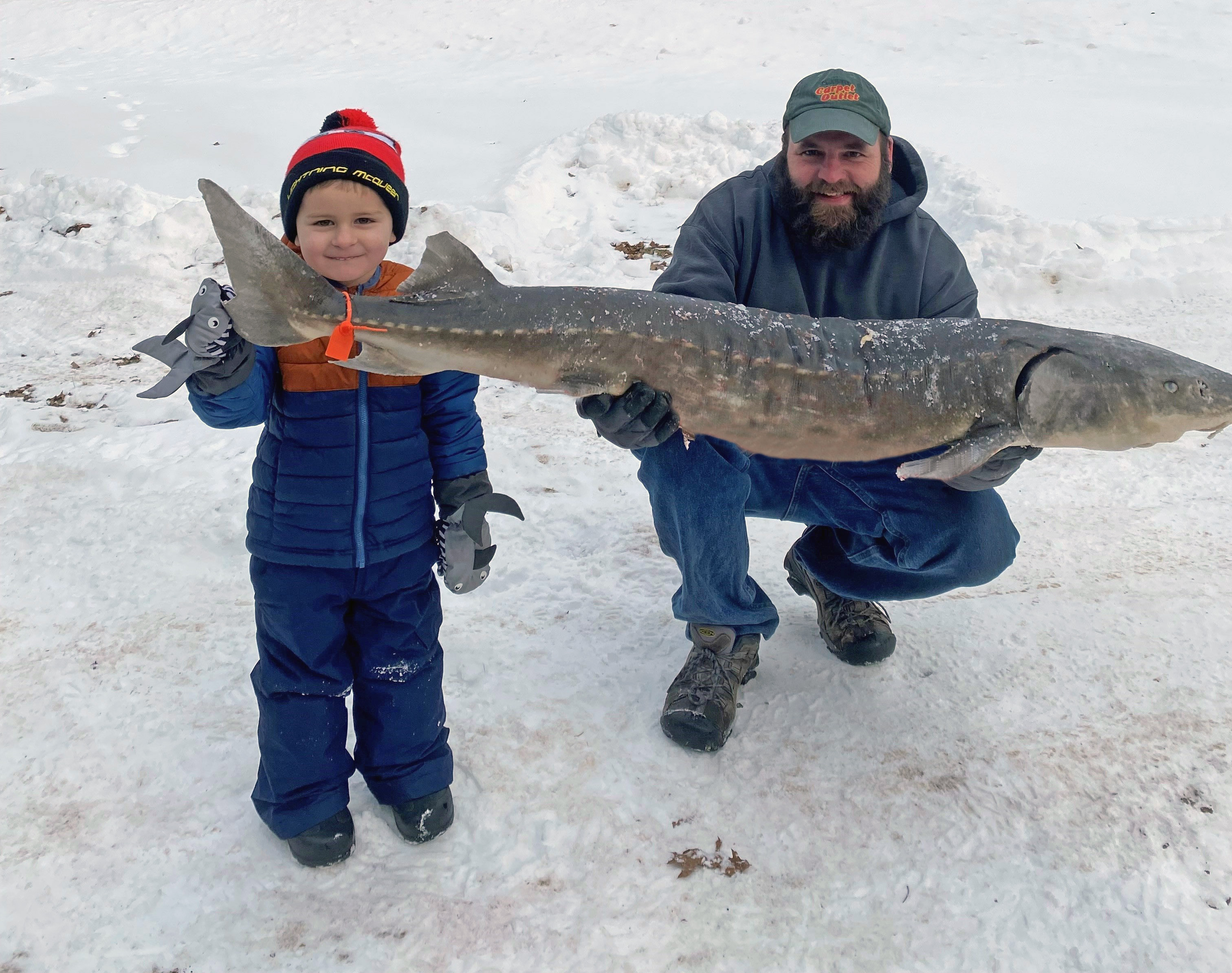Father reminisces on watching 11-year-old son spear final sturgeon