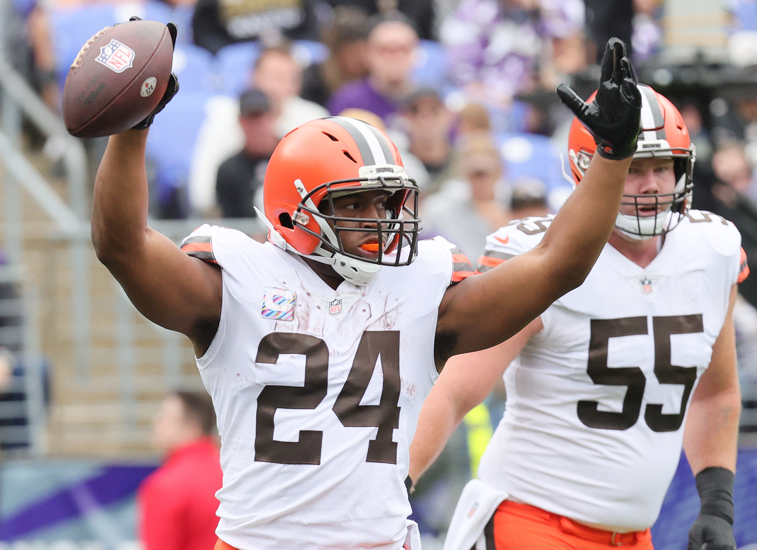 Baltimore Ravens safety Chuck Clark (36) and cornerback Marlon Humphrey (44)  miss a tackle of C …