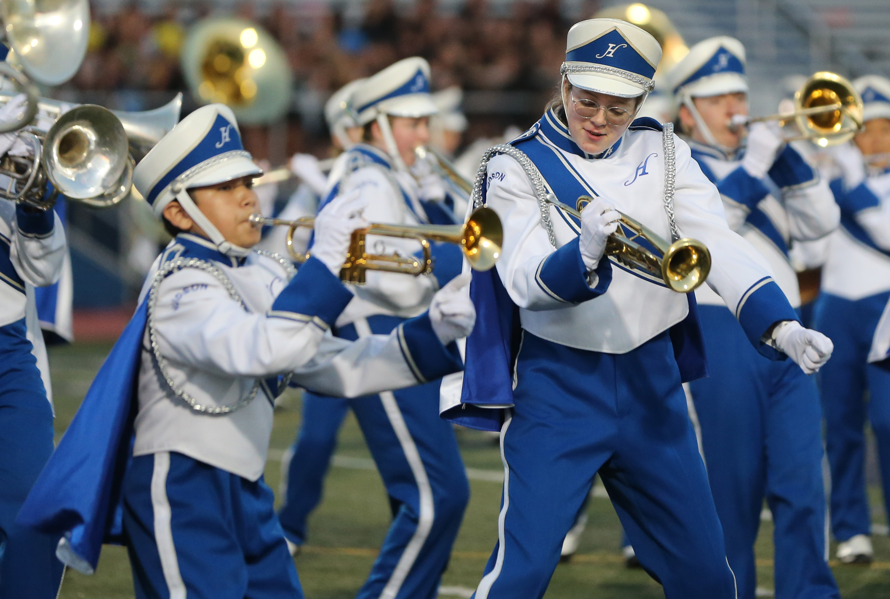 Hudson High School's marching band performs in their season home ...