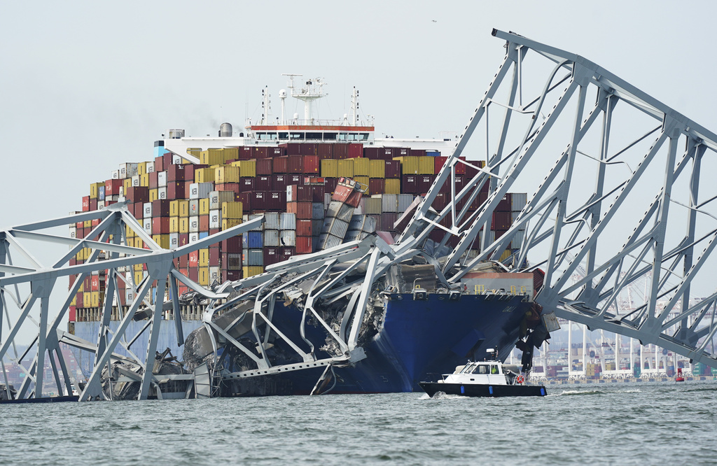 Baltimore bridge collapses after powerless cargo ship rams into support ...