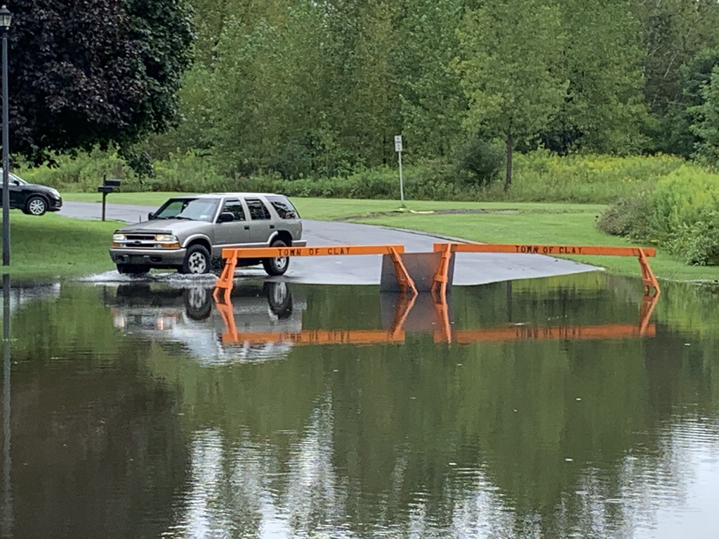 - Willow Stream overflowed during heavy rains, causing the closure of Shoveler Lane, between Canvasback Drive and Pintail Path, in Clay due to flooding on Thursday, Aug. 19, 2021. Rick Moriarty