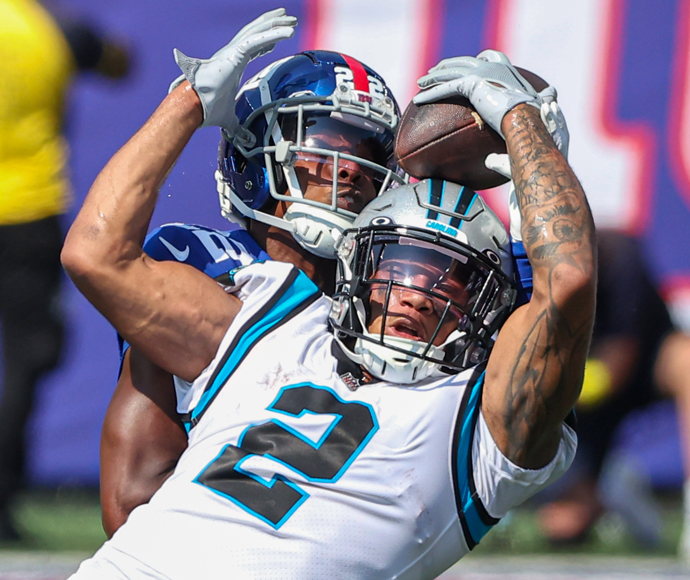 New York Giants players surround running back Saquon Barkley (kneeling)  after he scores a touchdown against the Carolina Panthers in the second  half of an NFL football game in Charlotte, North Carolina