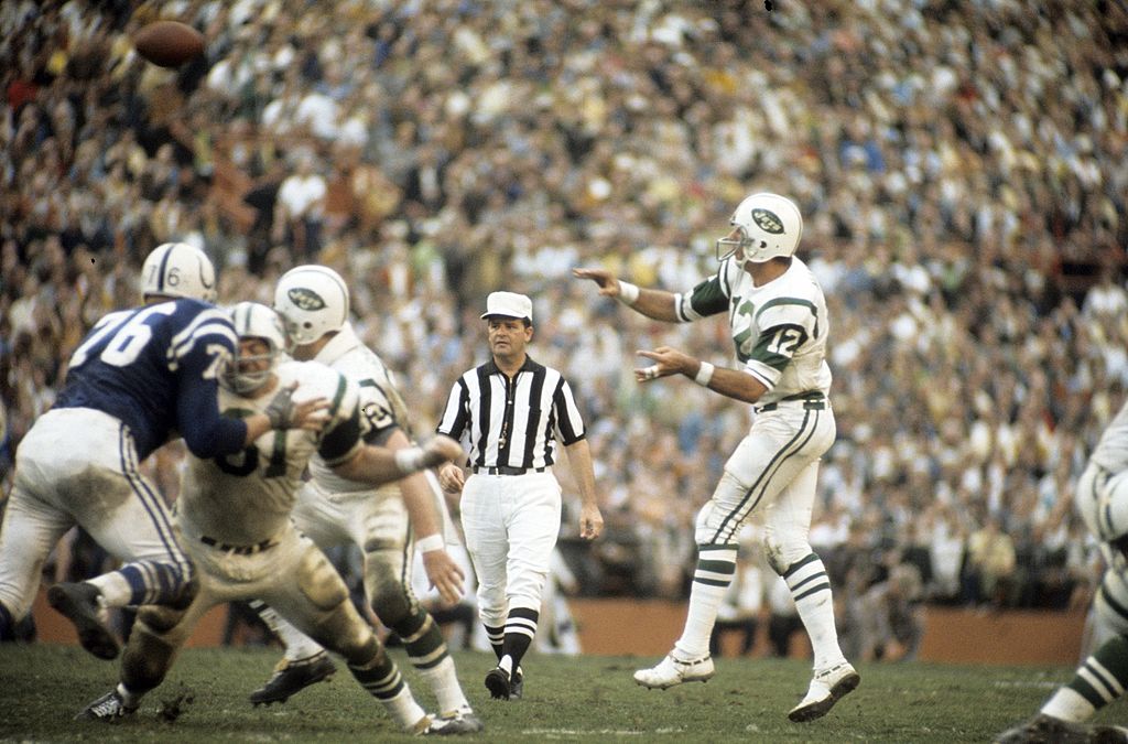 New York Jets hall of fame quarterback Joe Namath and Don Maynard (13)  stand on the field during a ceremony honoring the Super bowl III Jets at  halftime of the New York