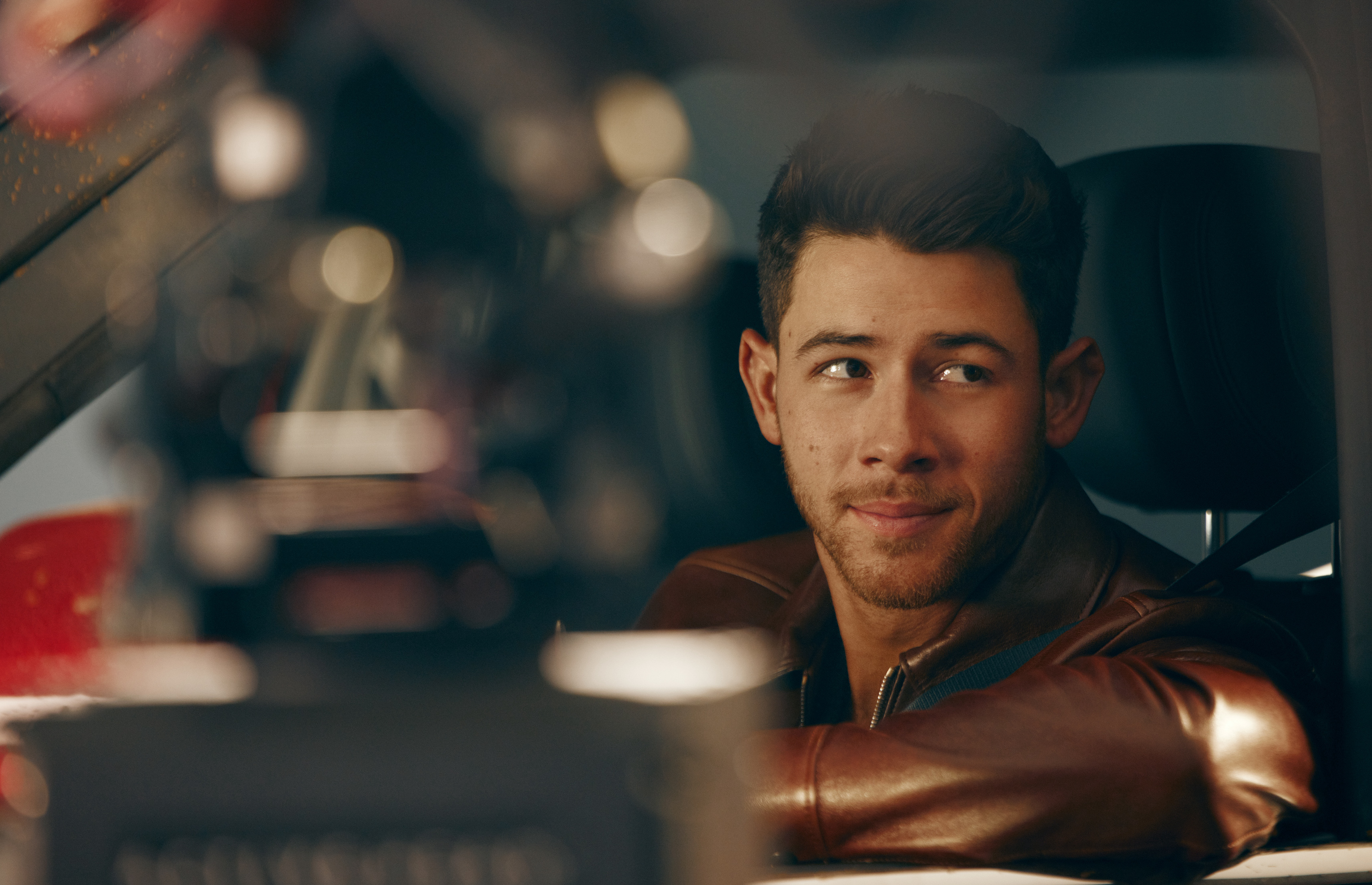 Nick Jonas tries to keep up with the Joneses in Super Bowl commercial -  